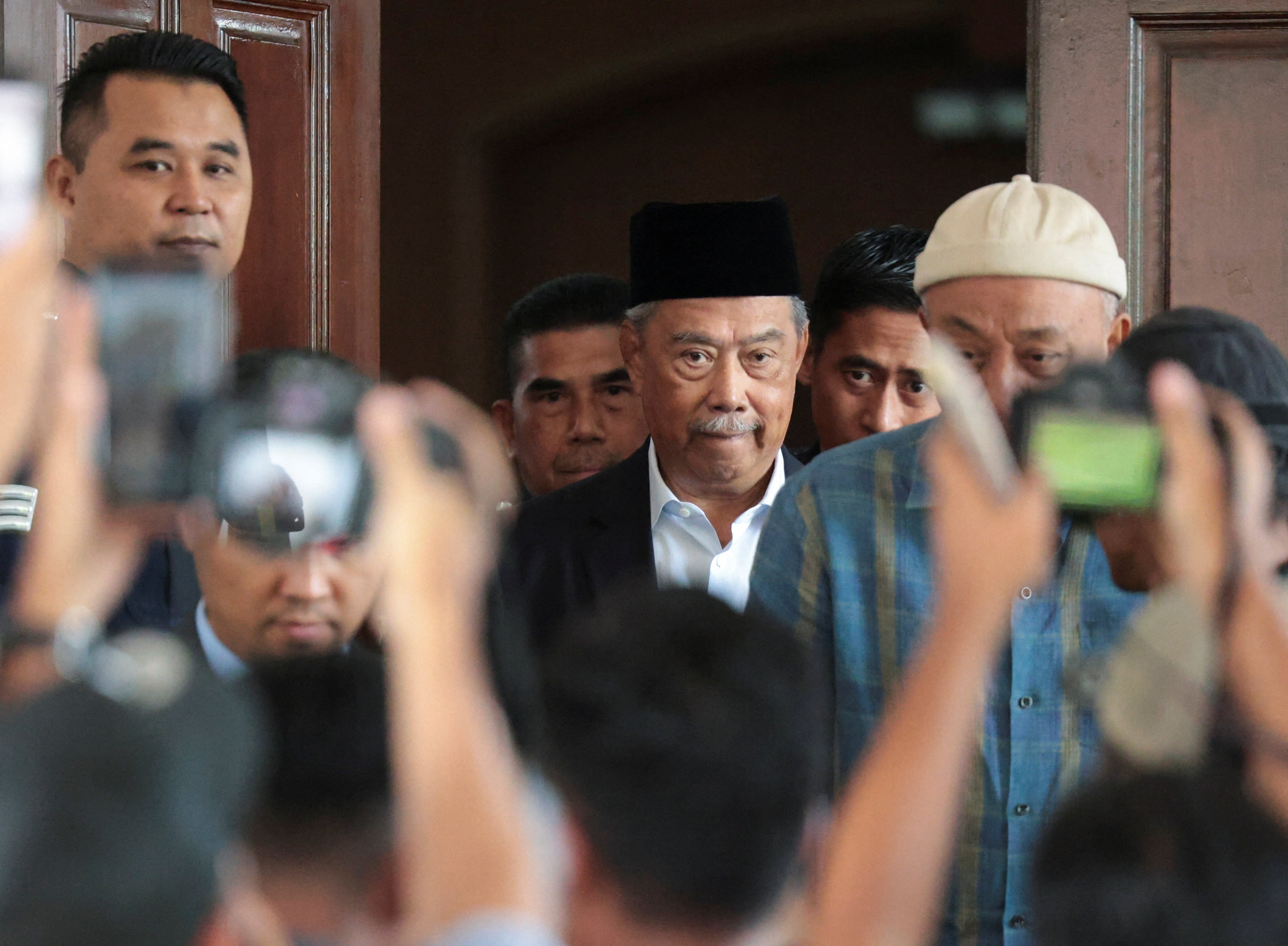 Former Malaysian prime minister Muhyiddin Yassin leaves court after a hearing into his case last month. Photo: Reuters