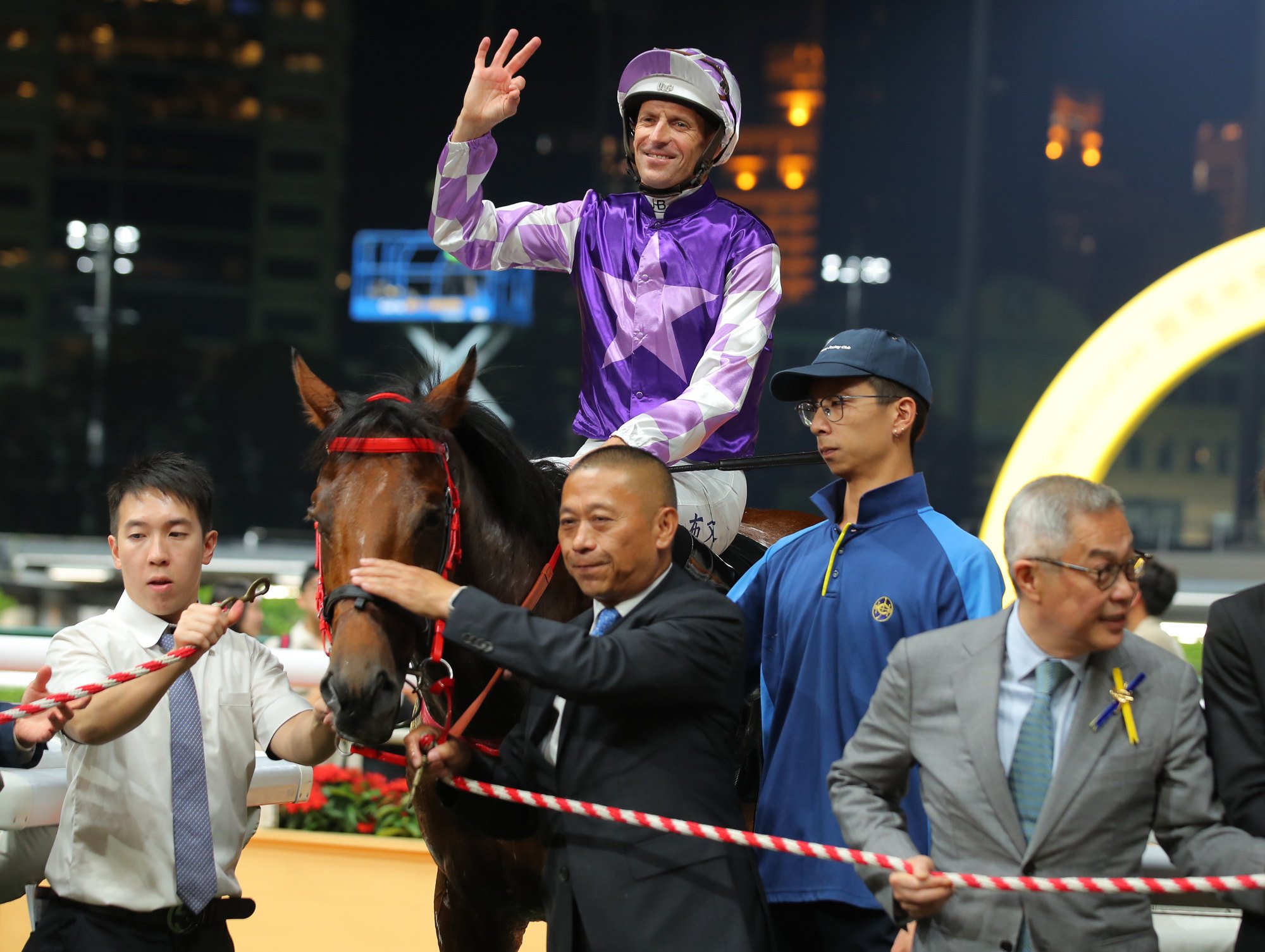 Danny Shum with Helene Warrior after his Happy Valley win under Hugh Bowman.