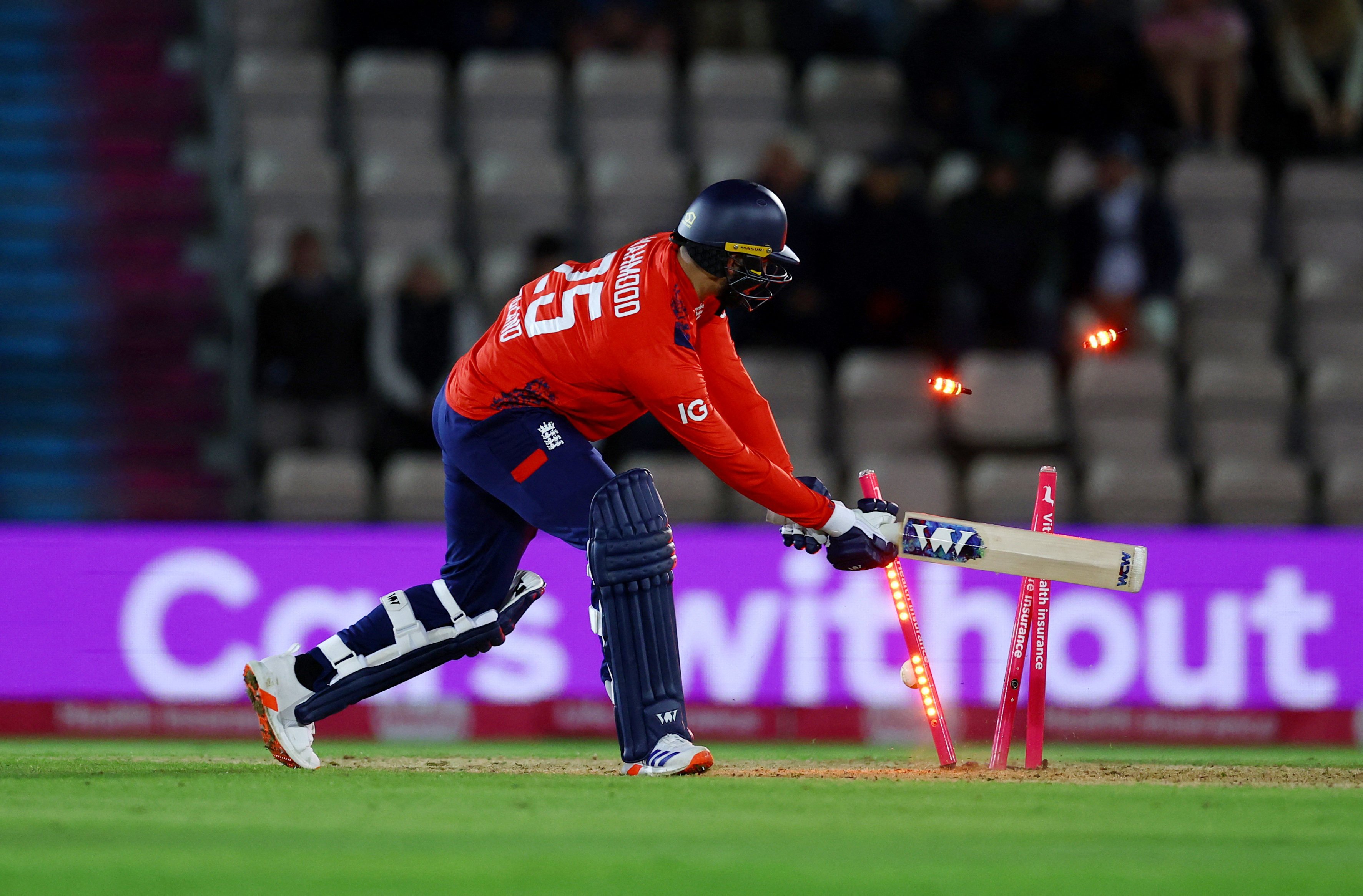 England’s Saqib Mahmood is bowled for 12 during his side’s T20 loss to Australia. Photo: Reuters