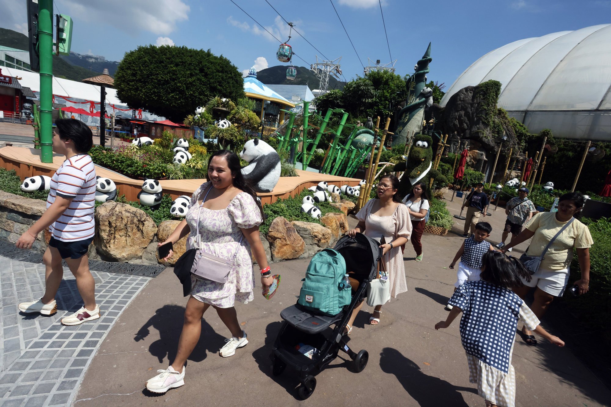 Visitors pass through Panda House at Ocean Park. Two adult pandas gifted by Beijing are expected to arrive on September 26. Photo: Jonathan Wong