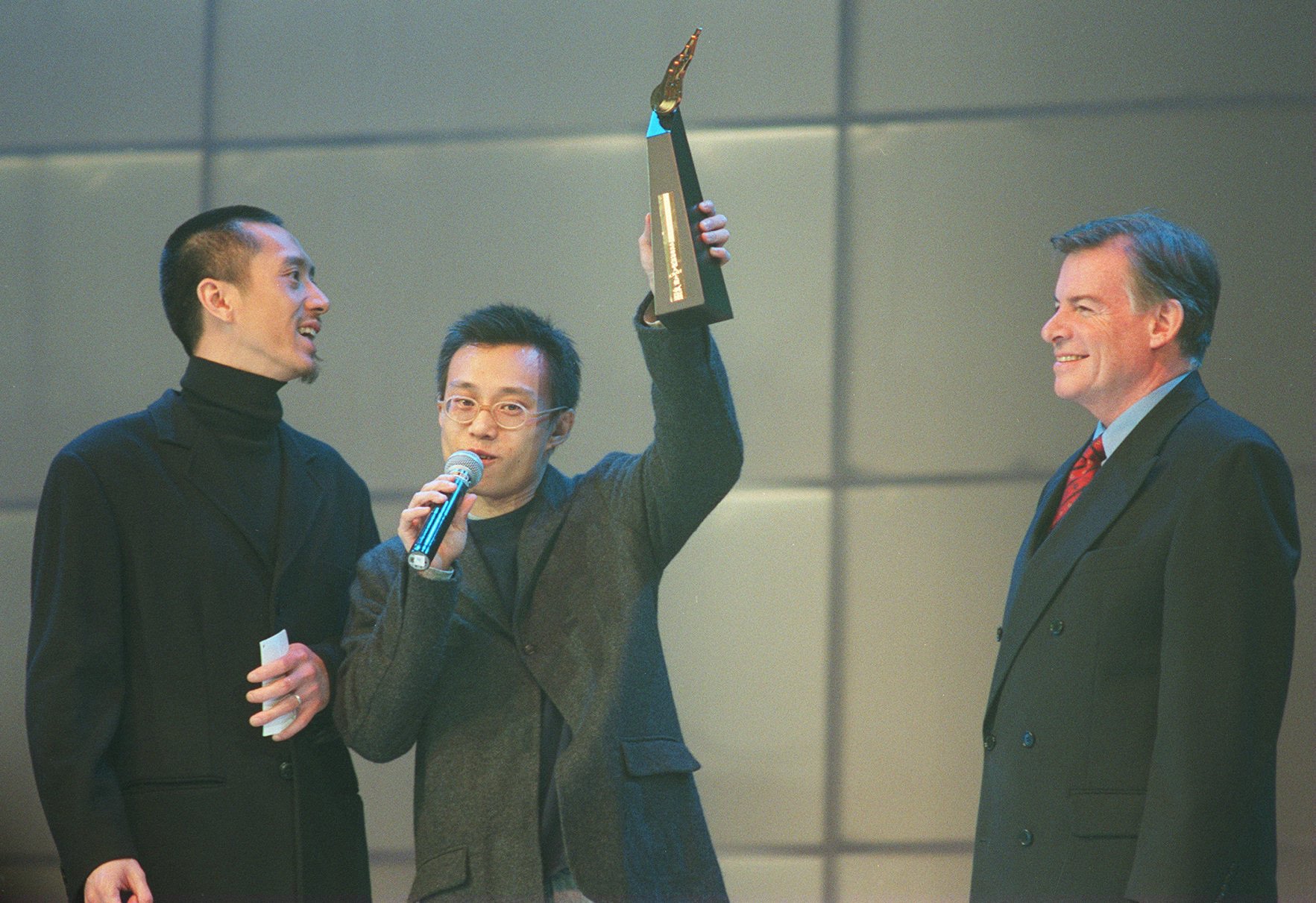 Albert Leung thanks the crowd for their support during the annual Ultimate Song Chart awards organised by Commercial Radio, in January 1999. Photo: SCMP