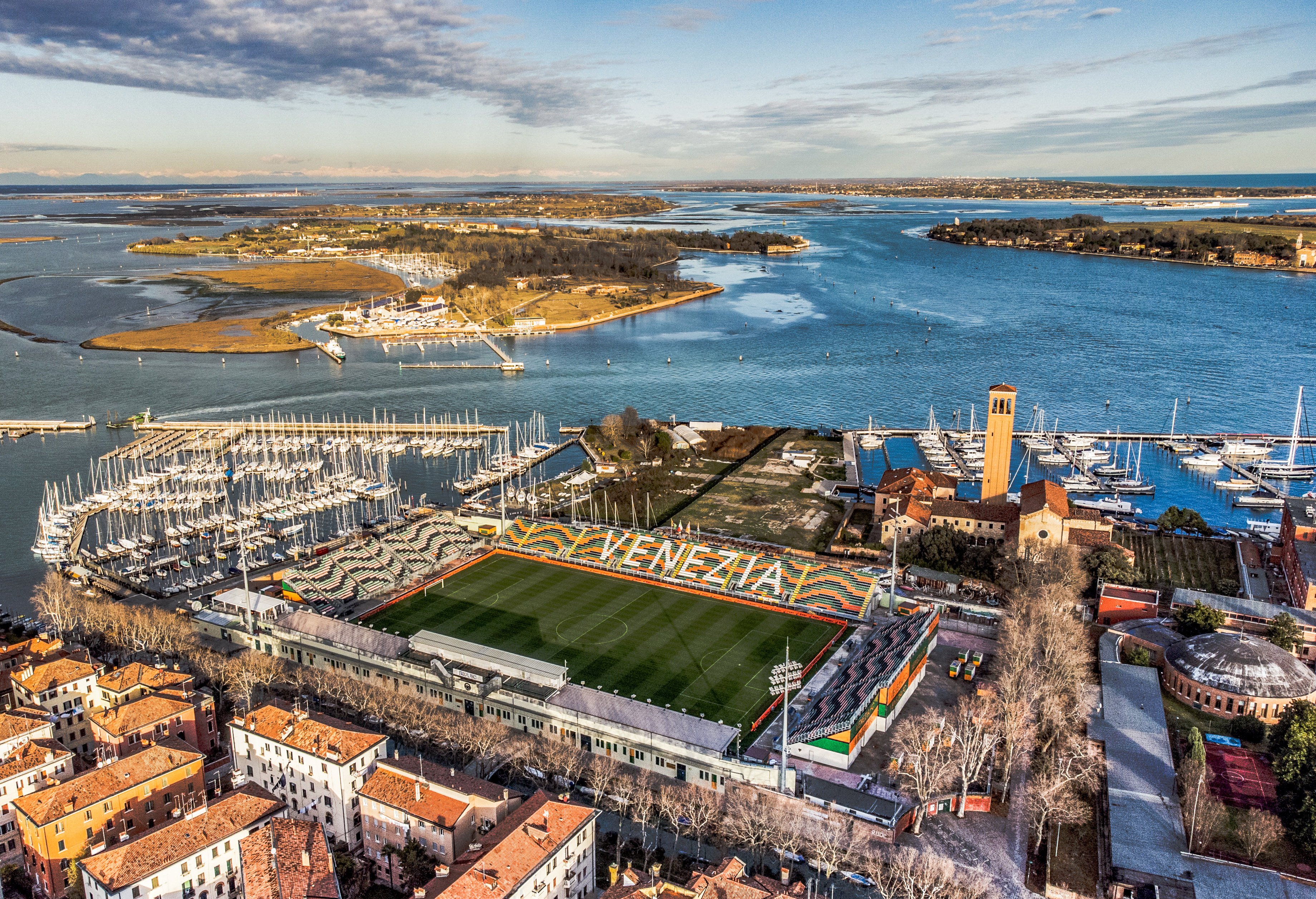 Venice’s hidden gem, the Pier Luigi Penzo stadium, dating from 1913 and with a capacity of just 11,000, looking out on the Venice lagoon and its islands, surrounded by a marina, ancient church and houses of the Sant’Elena neighbourhood. Photo: Venezia FC