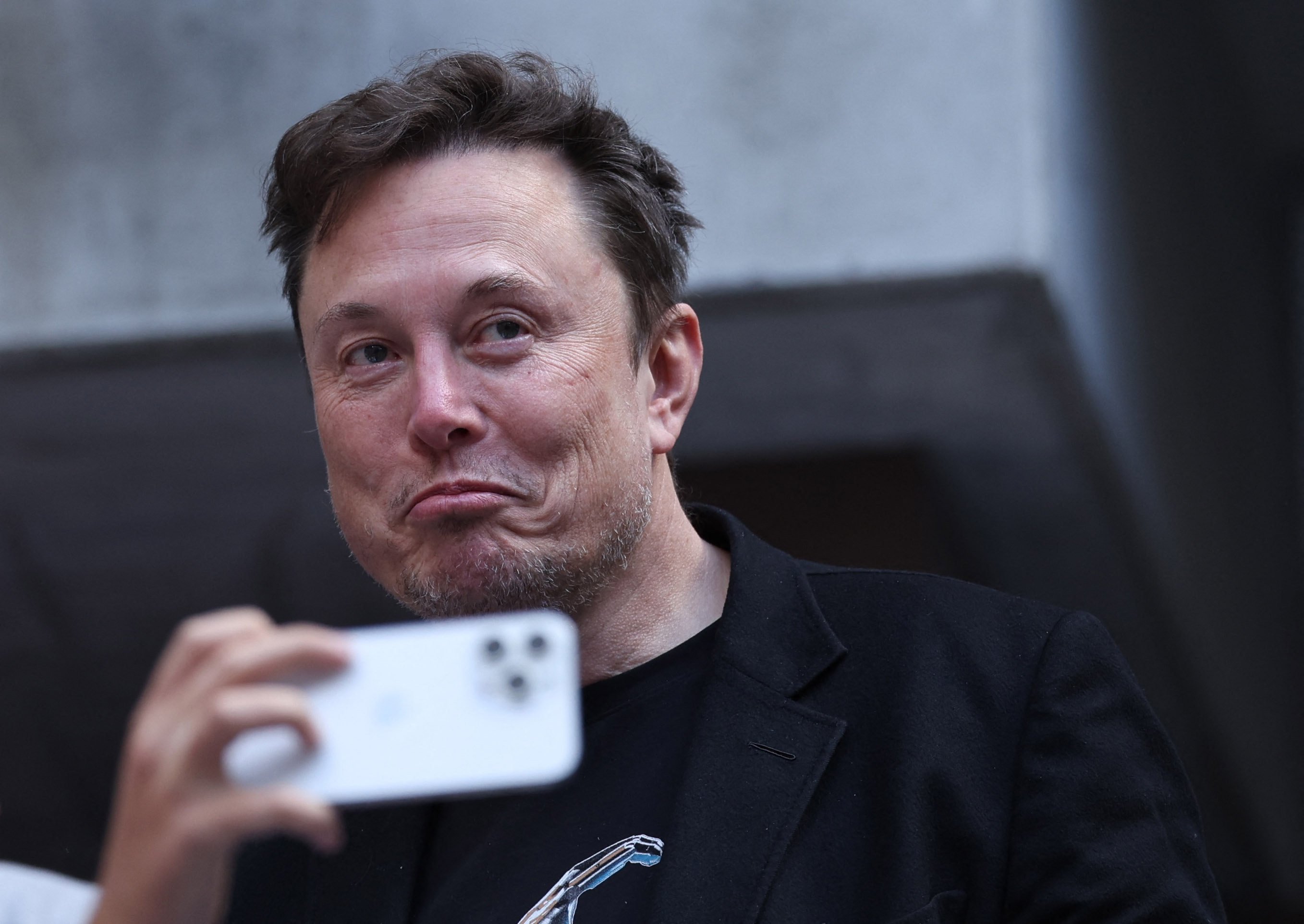 Elon Musk is seen at the US Open in New York on Sunday. Photo: Reuters