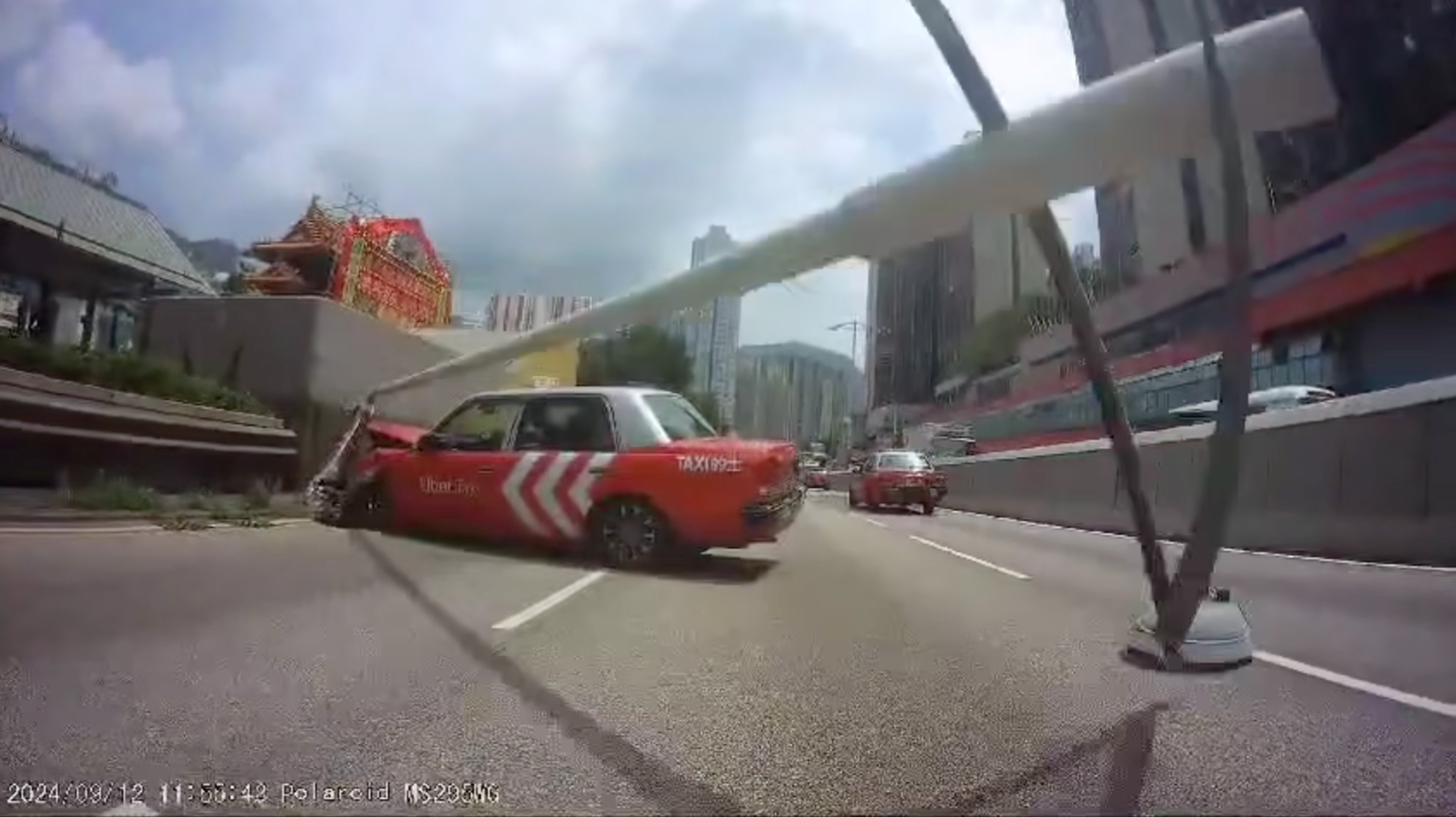 Dashcam footage captured the taxi when it lost control on a busy main road. Photo: Facebook/Bosco Chu