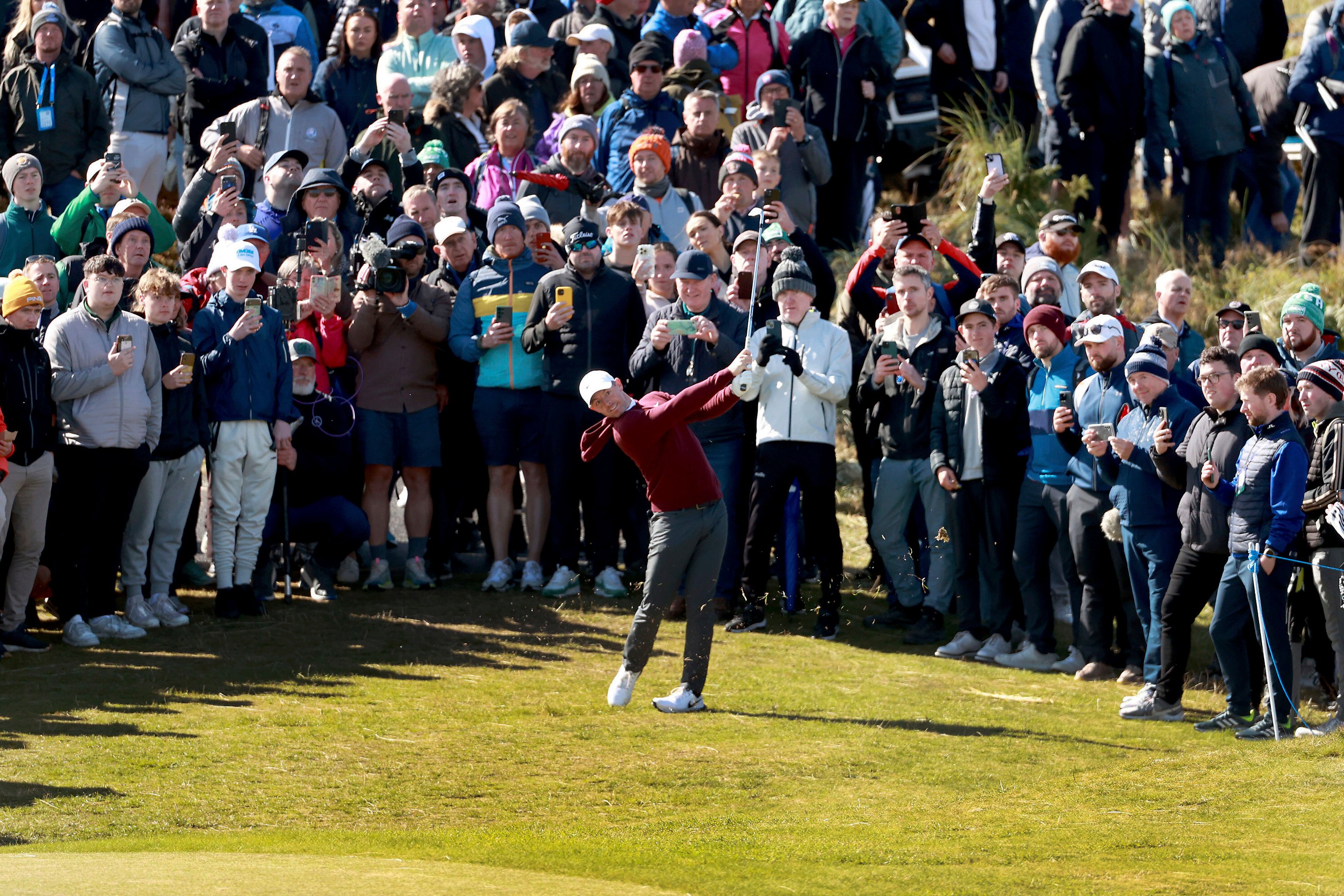 Northern Ireland’s Rory McIlroy hits a shot out of the rough on the second hole during the first round of the Irish Open at Royal County Down. Photo: AP