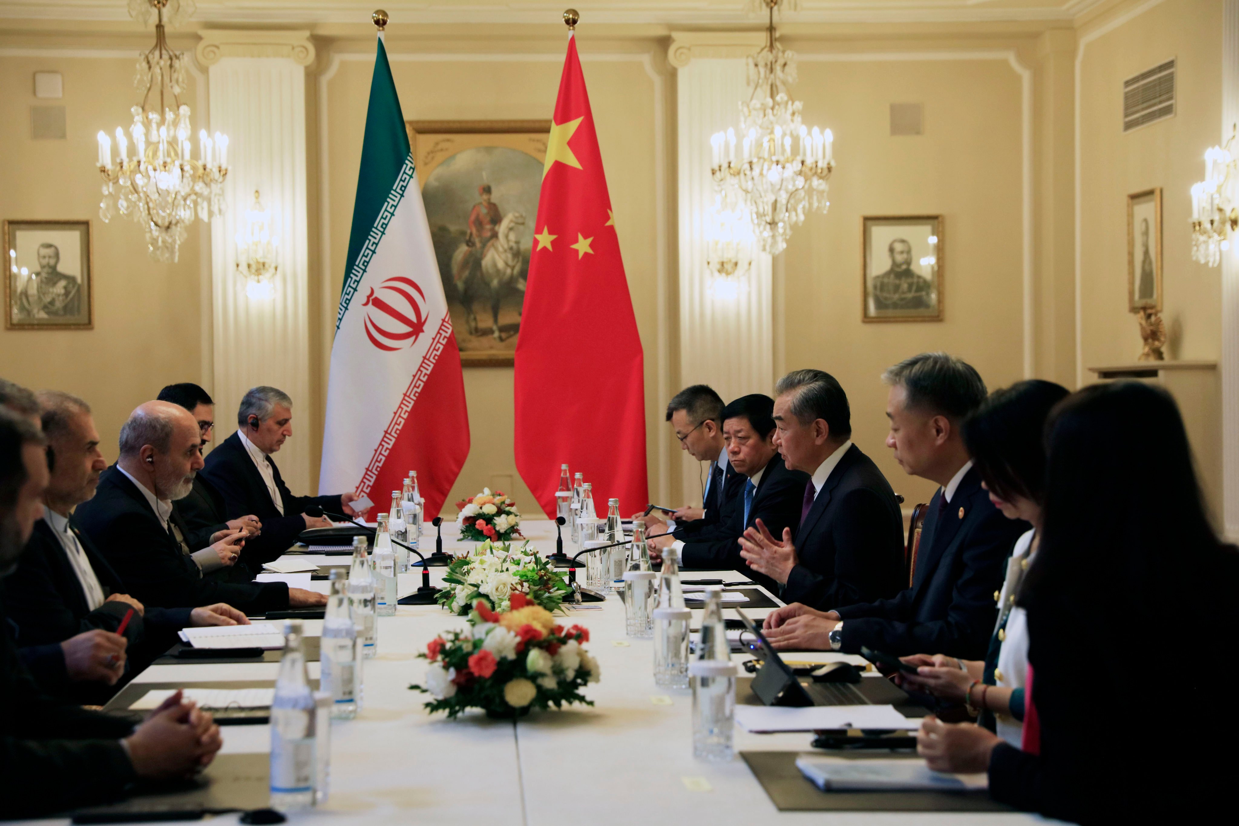 Chinese Foreign Minister Wang Yi (fourth from right) holds talks with Iran’s Supreme National Security Council Secretary Ali Ahmadian (third from left) on Thursday in St Petersburg, Russia. Photo: Handout via Xinhua