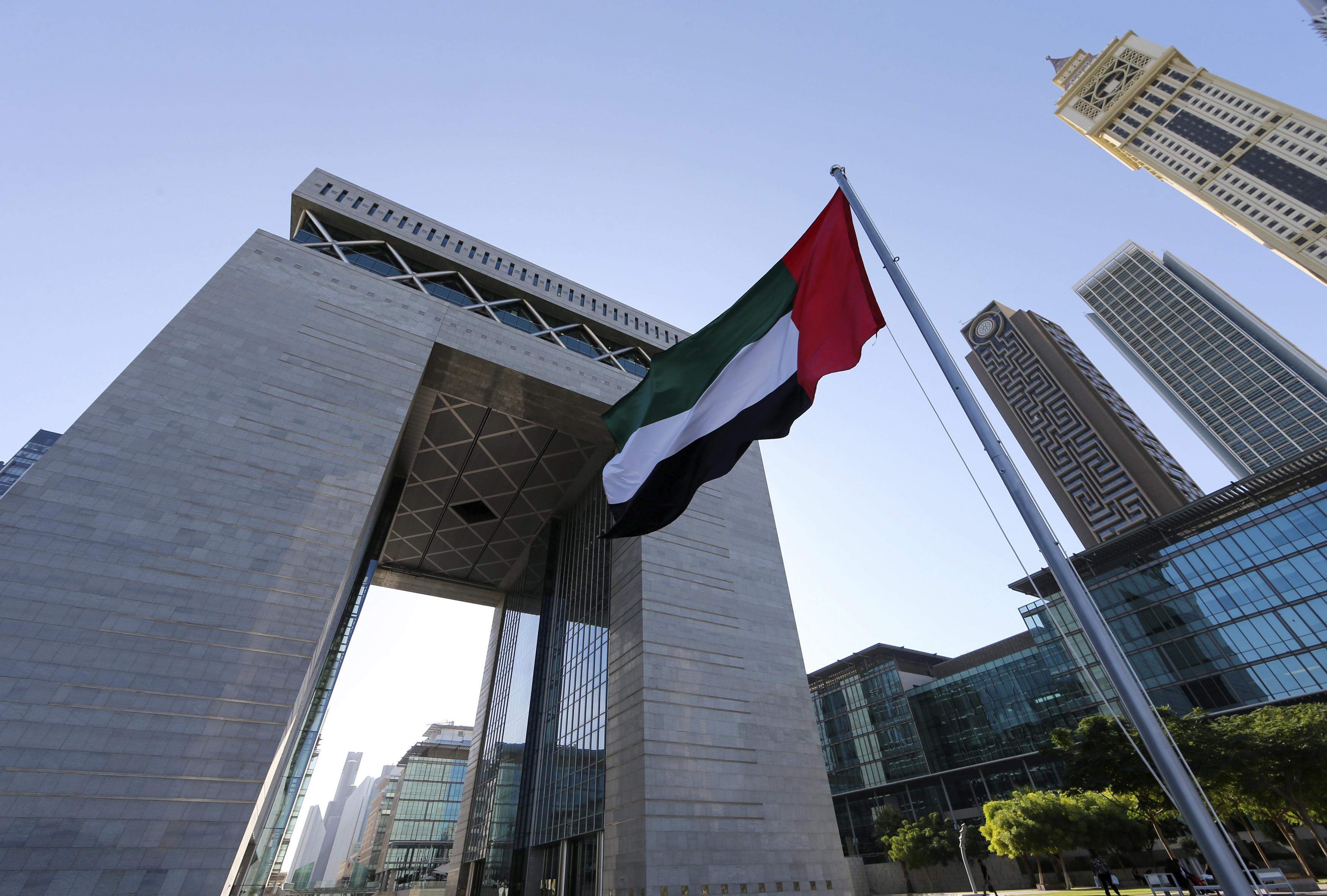 The UAE flag in front of the Dubai International Financial Centre in Dubai. Photo: Reuters