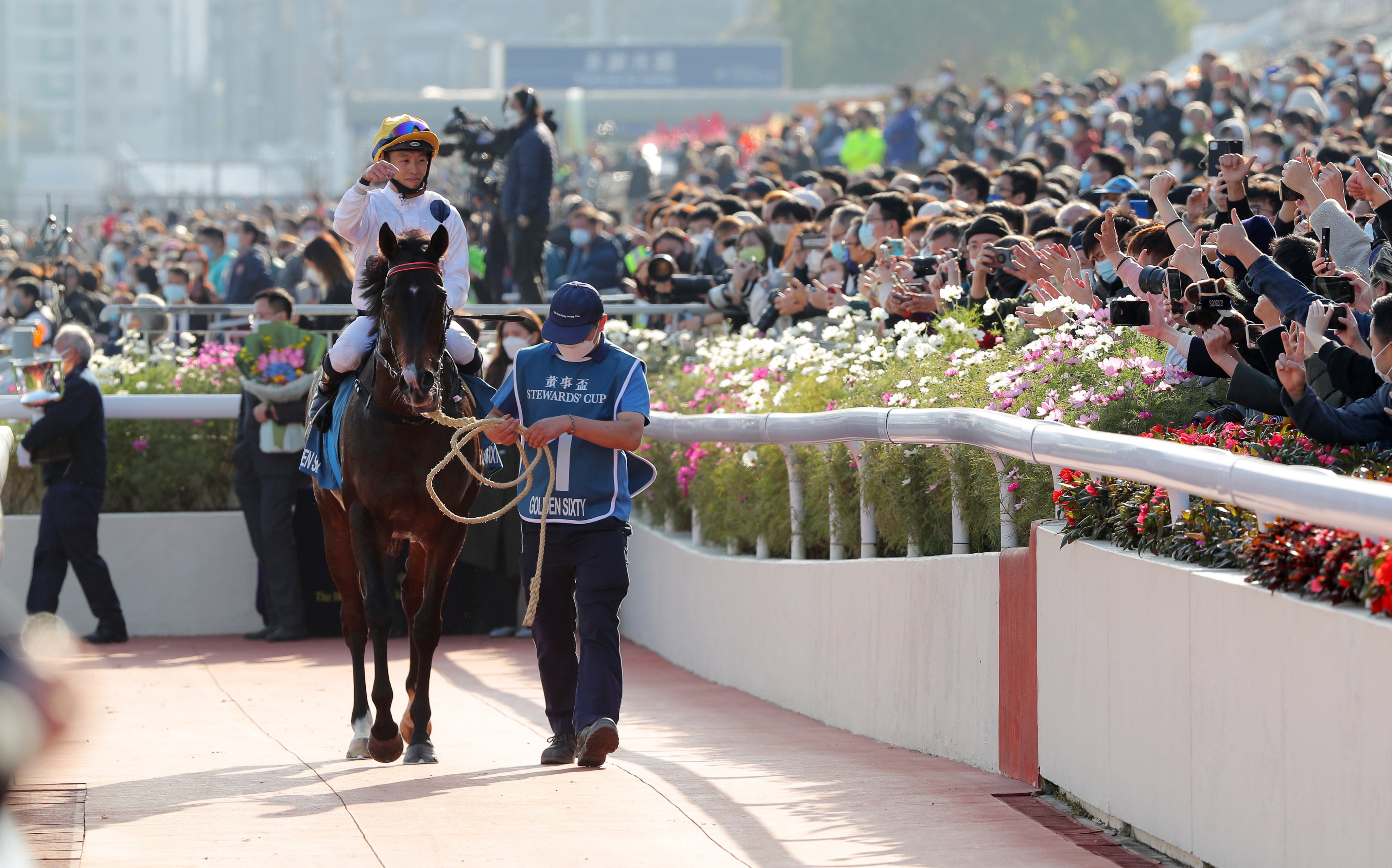 Golden Sixty gets a hero’s welcome from the Sha Tin crowd. Photo: Kenneth Chan