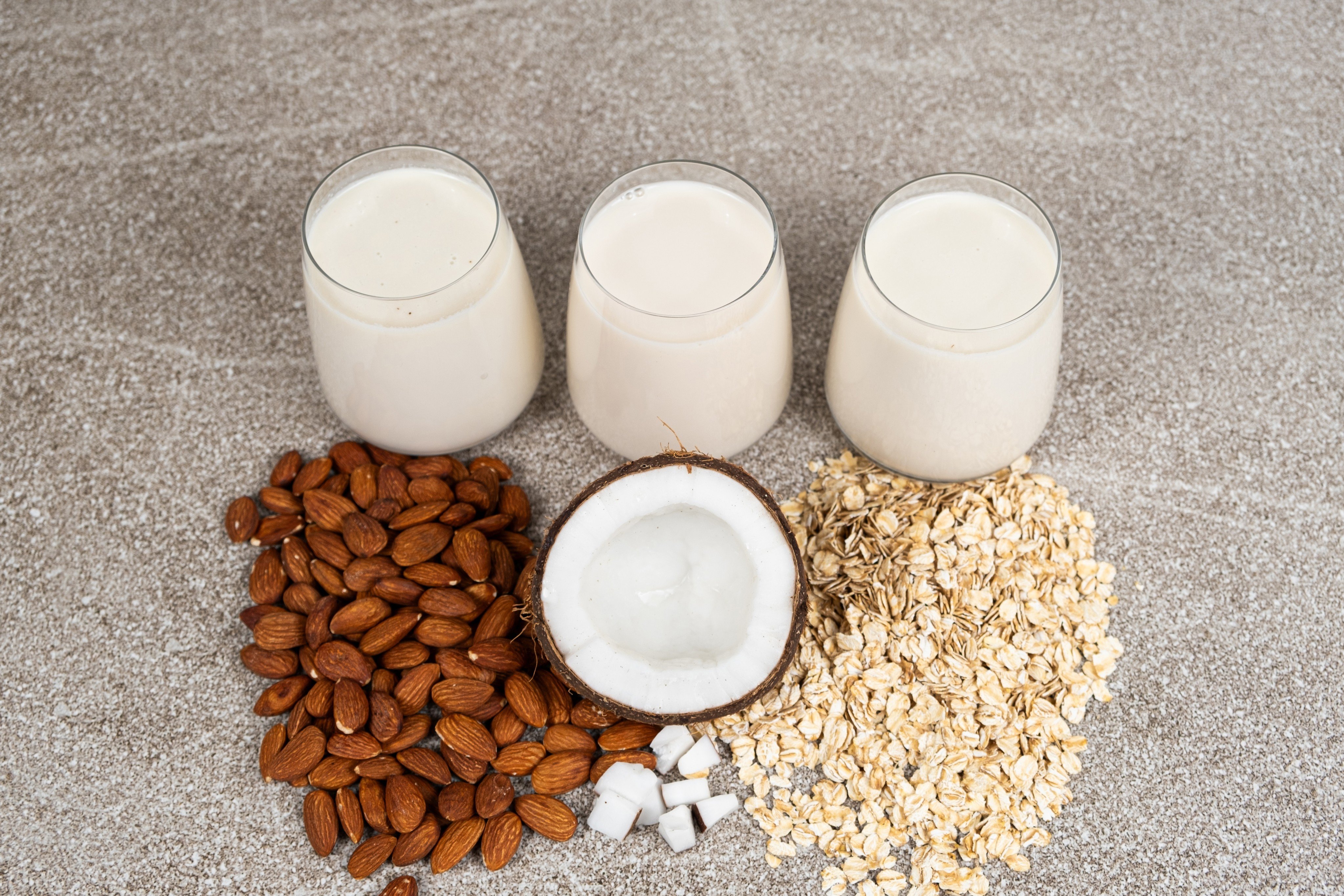 Plant-based milks such as oat, coconut, soy and almond milks are healthy alternatives to cow’s milk. Photo: Shutterstock