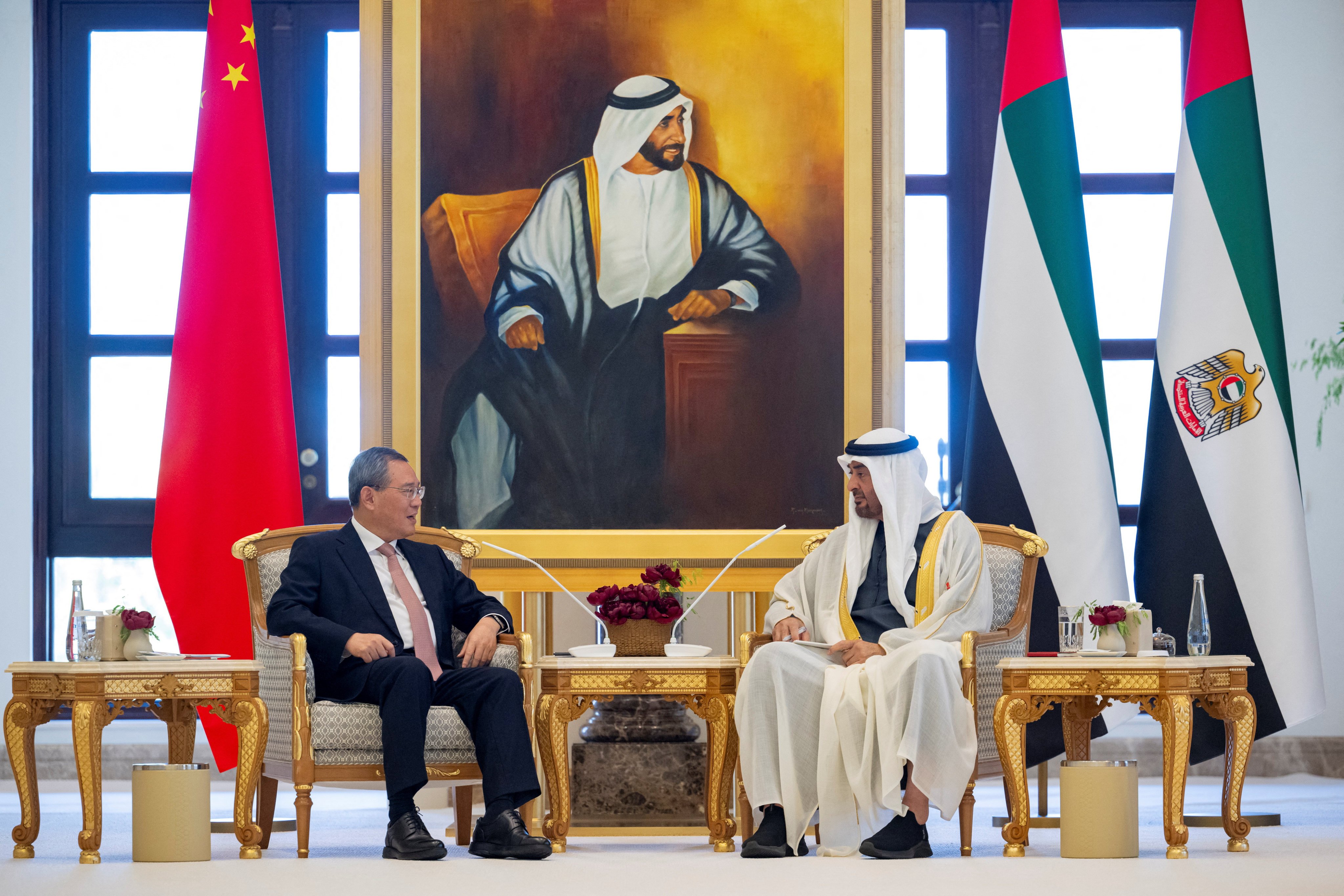 Chinese Premier Li Qiang with UAE President Sheikh Mohamed bin Zayed Al Nahyan, during an official reception in Abu Dhabi, UAE, on Thursday. Photo: Handout via Reuters 