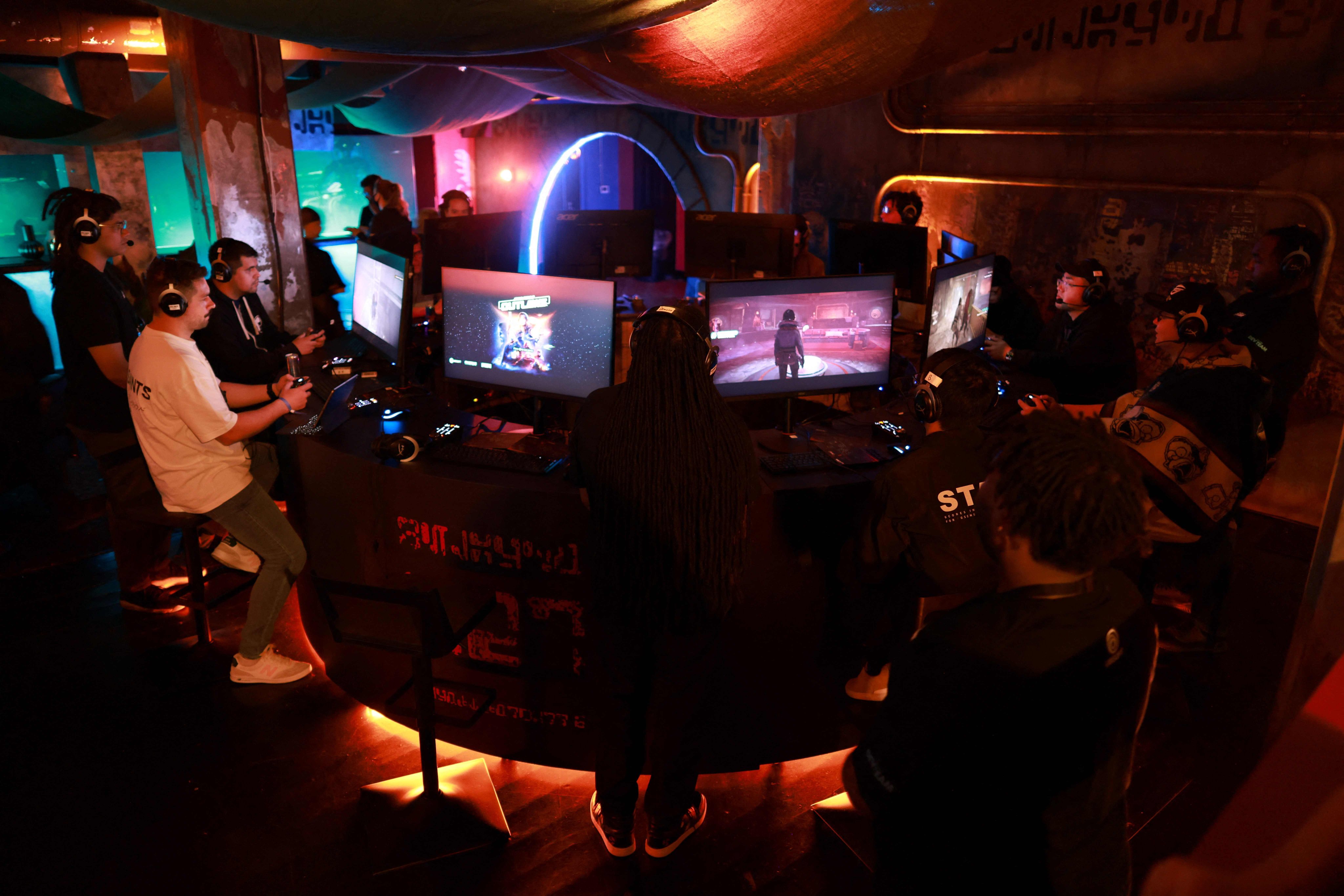 Attendees play Star Wars Outlaws at Ubisoft’s Forward conference in Los Angeles. Photo: AFP