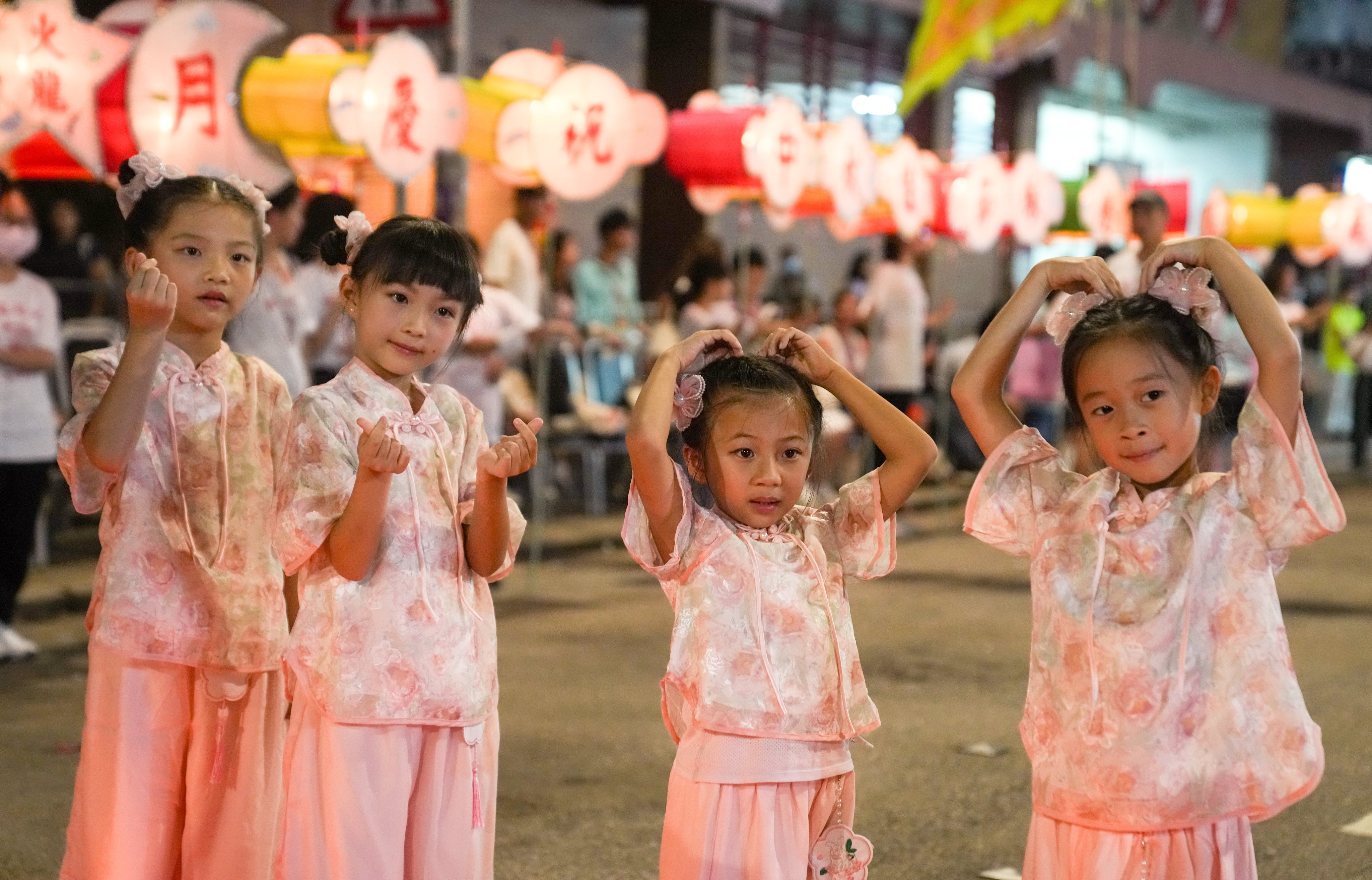 Children take part during the annual fire dragon dance parade in celebration of the Mid Autumn Festival in Tai Hang, Hong Kong, in 2023. You can buy souvenirs at this years event at the Tai Hang Fire Dragon Heritage Centre. Photo: Sam Tsang