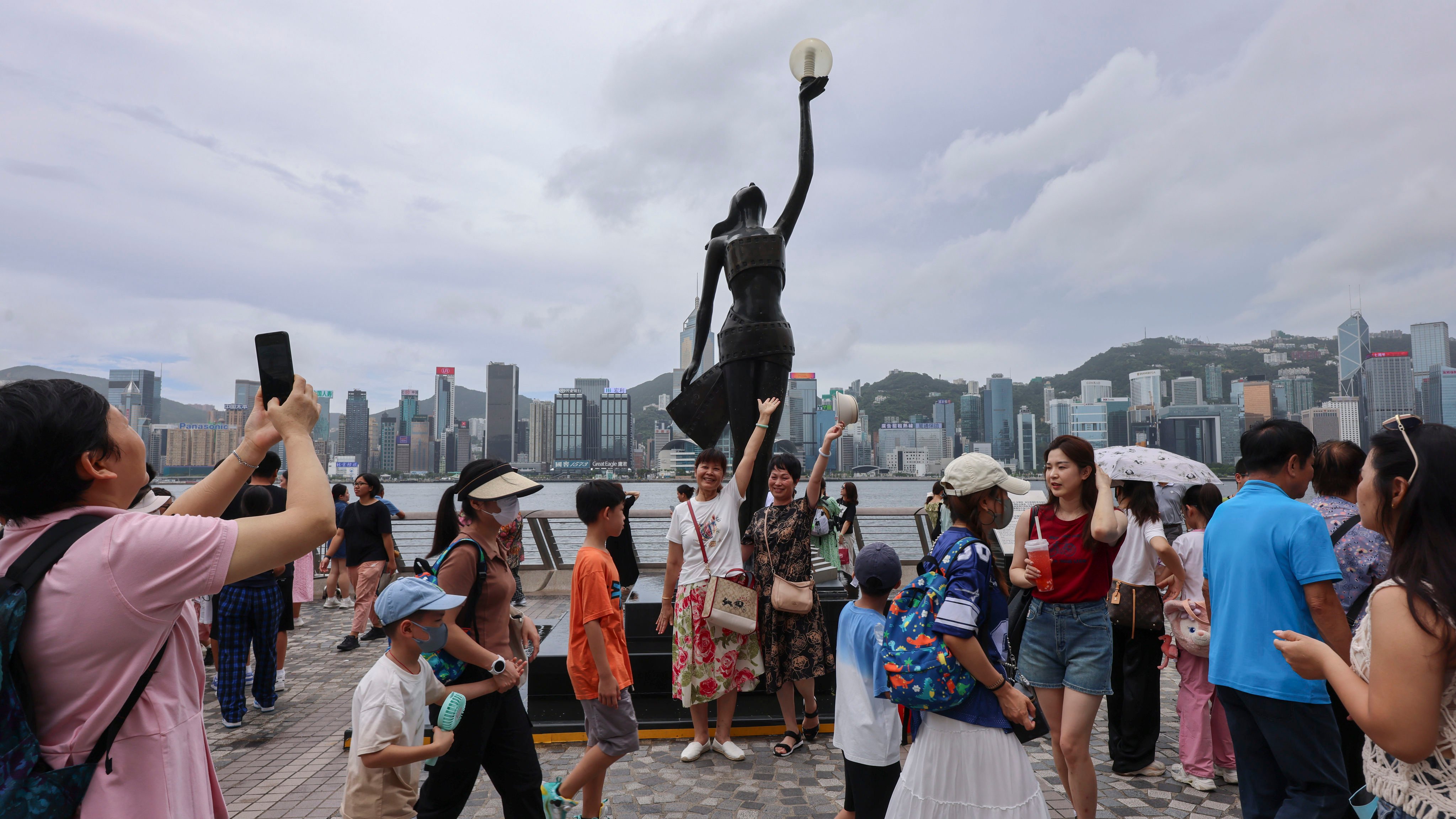 Tourists visit the Avenue of Stars in Tsim Sha Tsui, on July 16. Photo: Jelly Tse