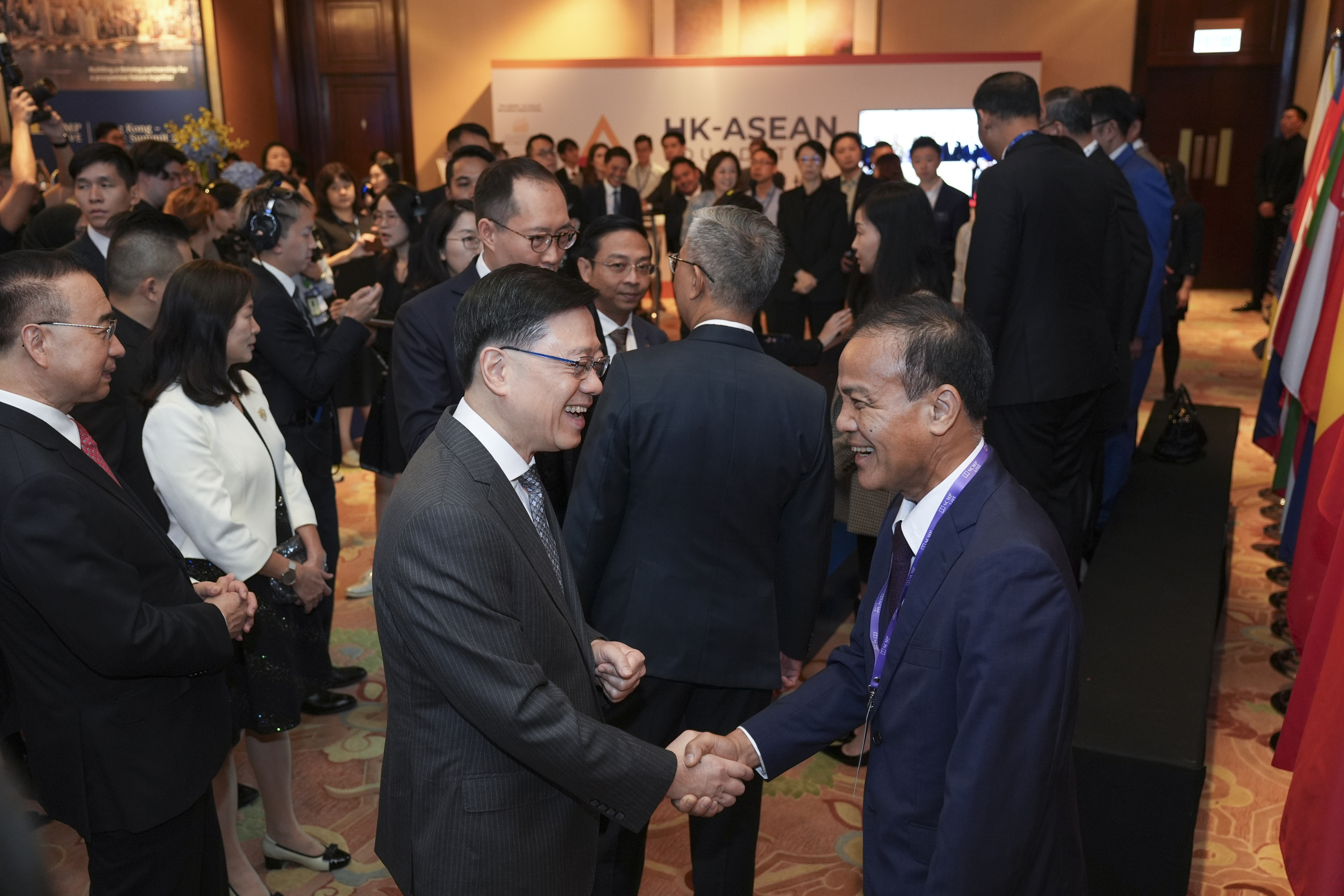 John Lee Ka-chiu (left), Chief Executive of Hong Kong, and Phouthanouphet Saysombath, Lao’s Deputy Minister of Finance speake during the Hong Kong - Asean Summit 2024 on September 13. Photo: Eugene Lee