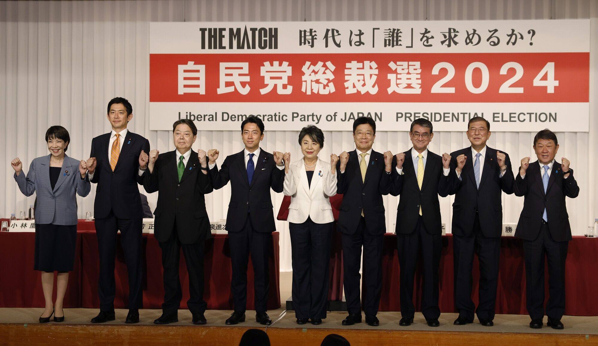 The nine candiates for leader of the LDP pose at the party’s headquarters in Tokyo. Photo: EPA