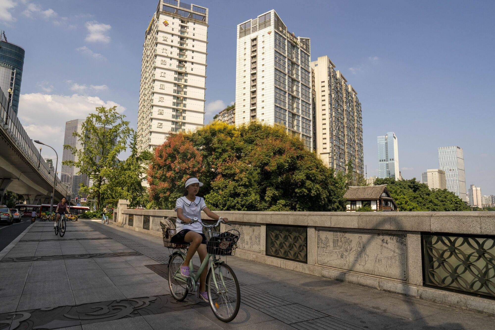 Residential buildings in Chengdu on Monday, Augist 19. China may cut mortgage financing rates to restore confidence in the industry. Photo: Bloomberg