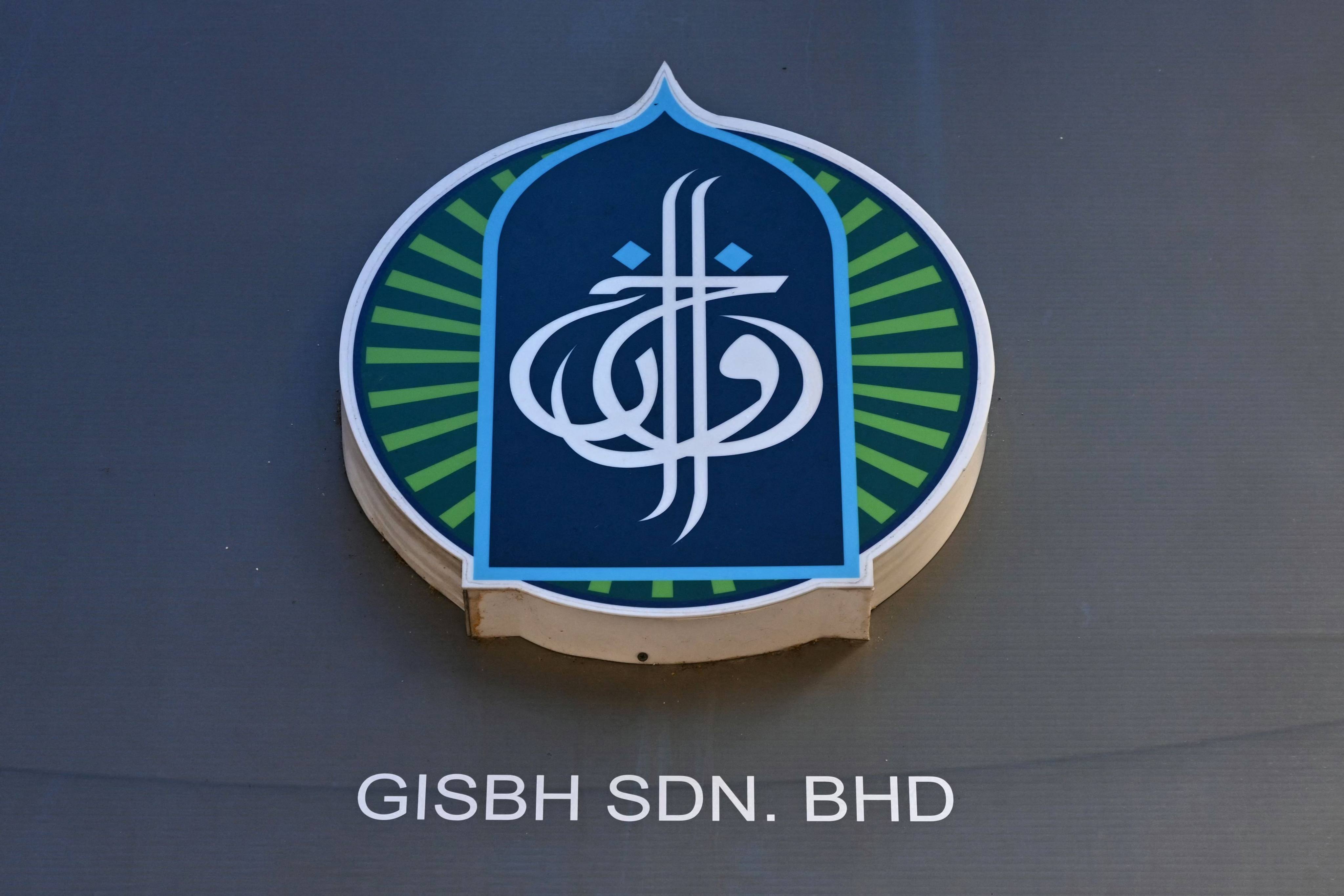 The logo of Global Ikhwan Services and Business (GISB) is pictured on side of a GISB office building in Rawang, outside Kuala Lumpur, on September 12, 2024. Photo: AFP