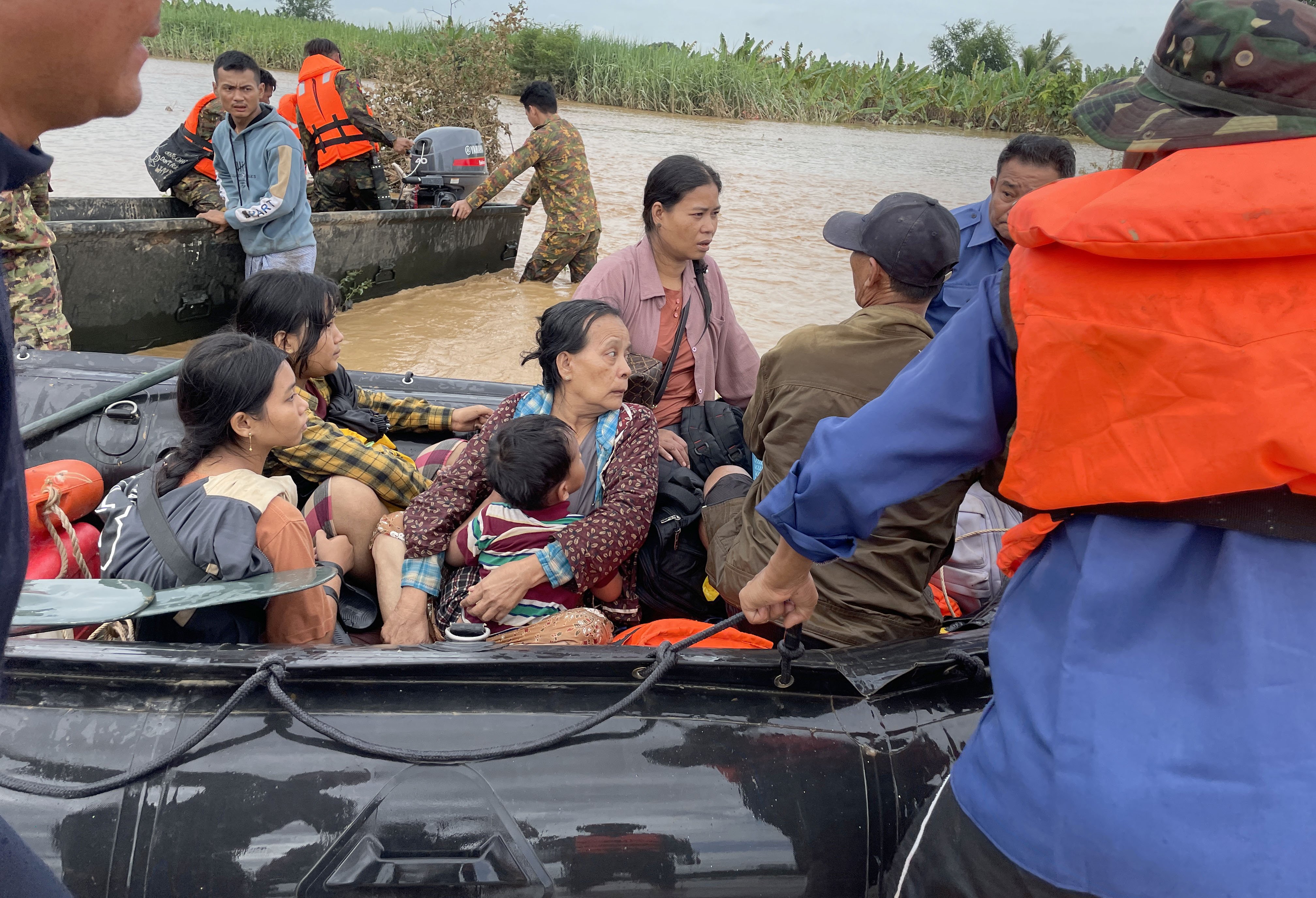 Soldiers help flood victims in Pyinmana, Naypyidaw, Myanmar, following heavy rains which triggered massive flooding. Photo: EPA-EFE