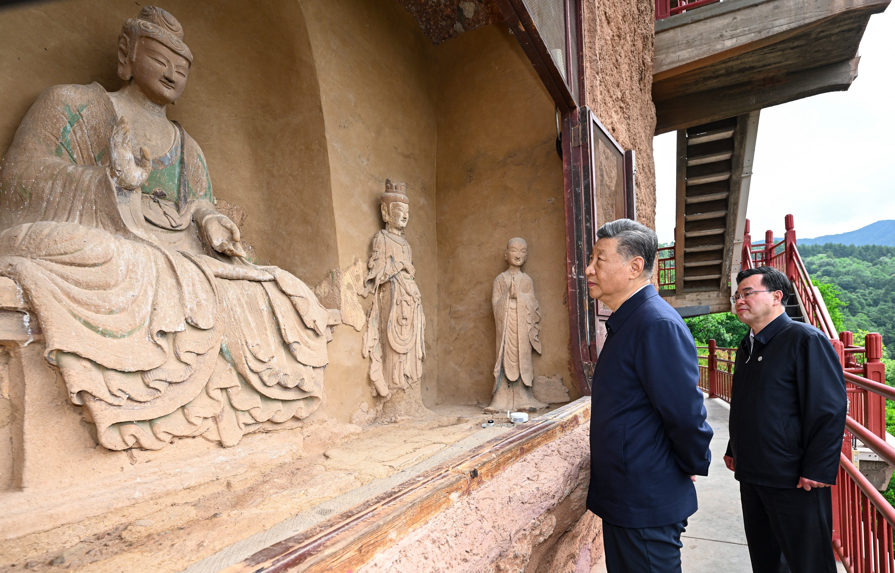 Chinese President Xi Jinping visits the Maijishan Grottoes, a Unesco-listed heritage site, in northwest China’s Gansu province on Wednesday. Photo: Xinhua