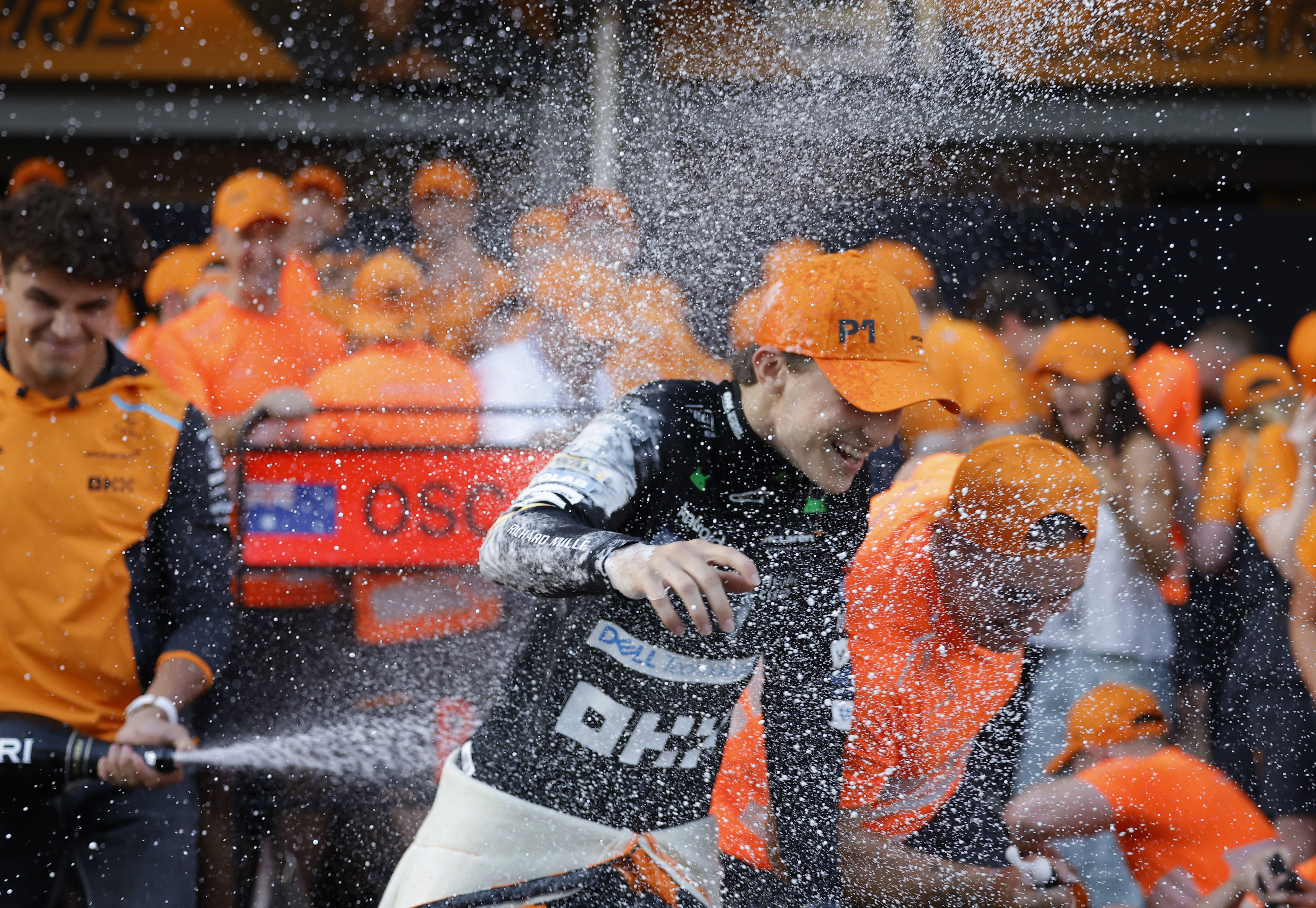 McLaren’s Oscar Piastri is sprayed by teammates in the garage after winning the Azerbaijan Grand Prix in Baku. Photo: Reuters