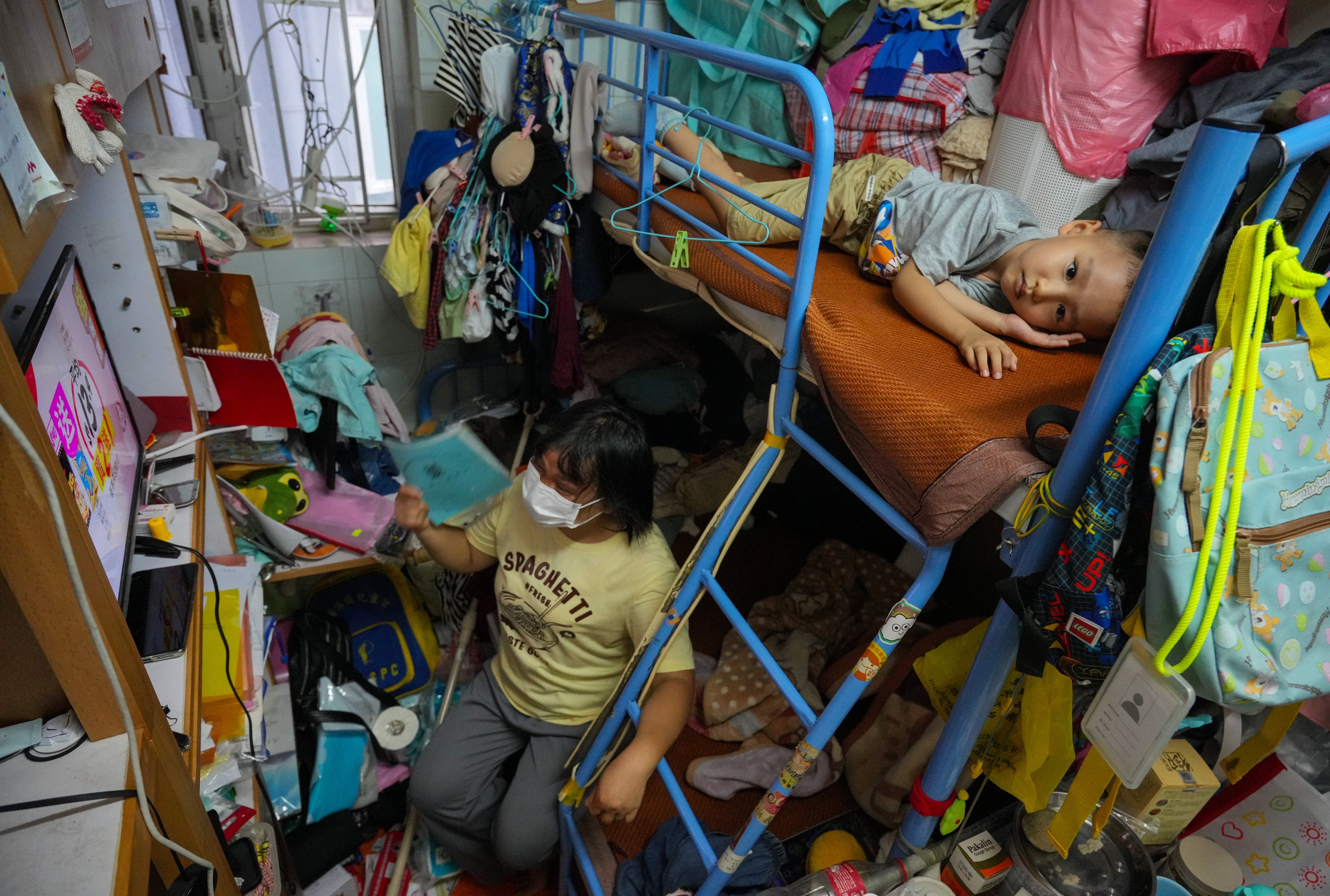 Ho Mei-ying, 42, and her family live in a subdivided flat of less than 100 sq ft. Photo: May Tse