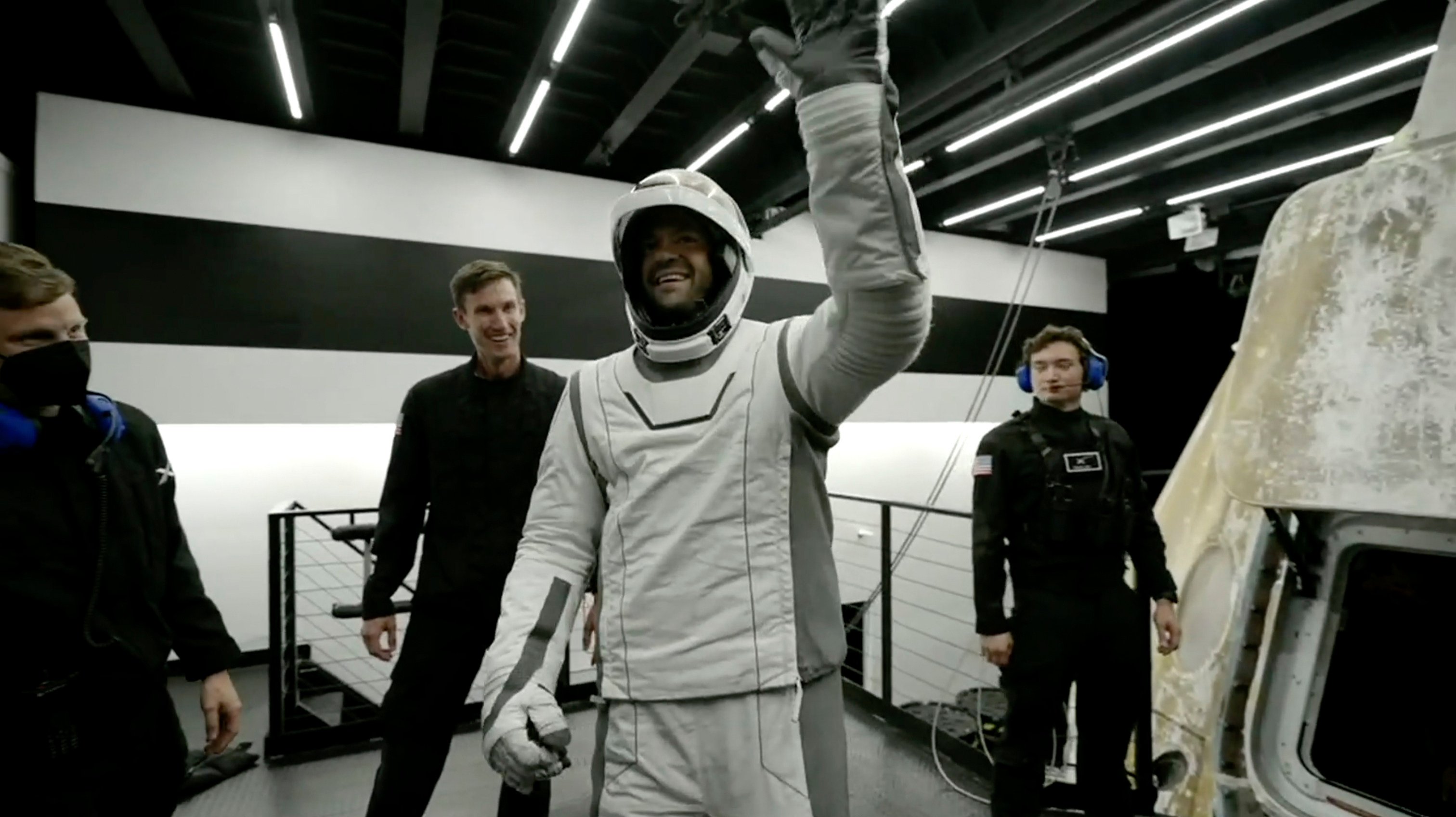 Tech entrepreneur Jared Isaacman reacts upon his return to Earth from space on Sunday. Photo: SpaceX via AP