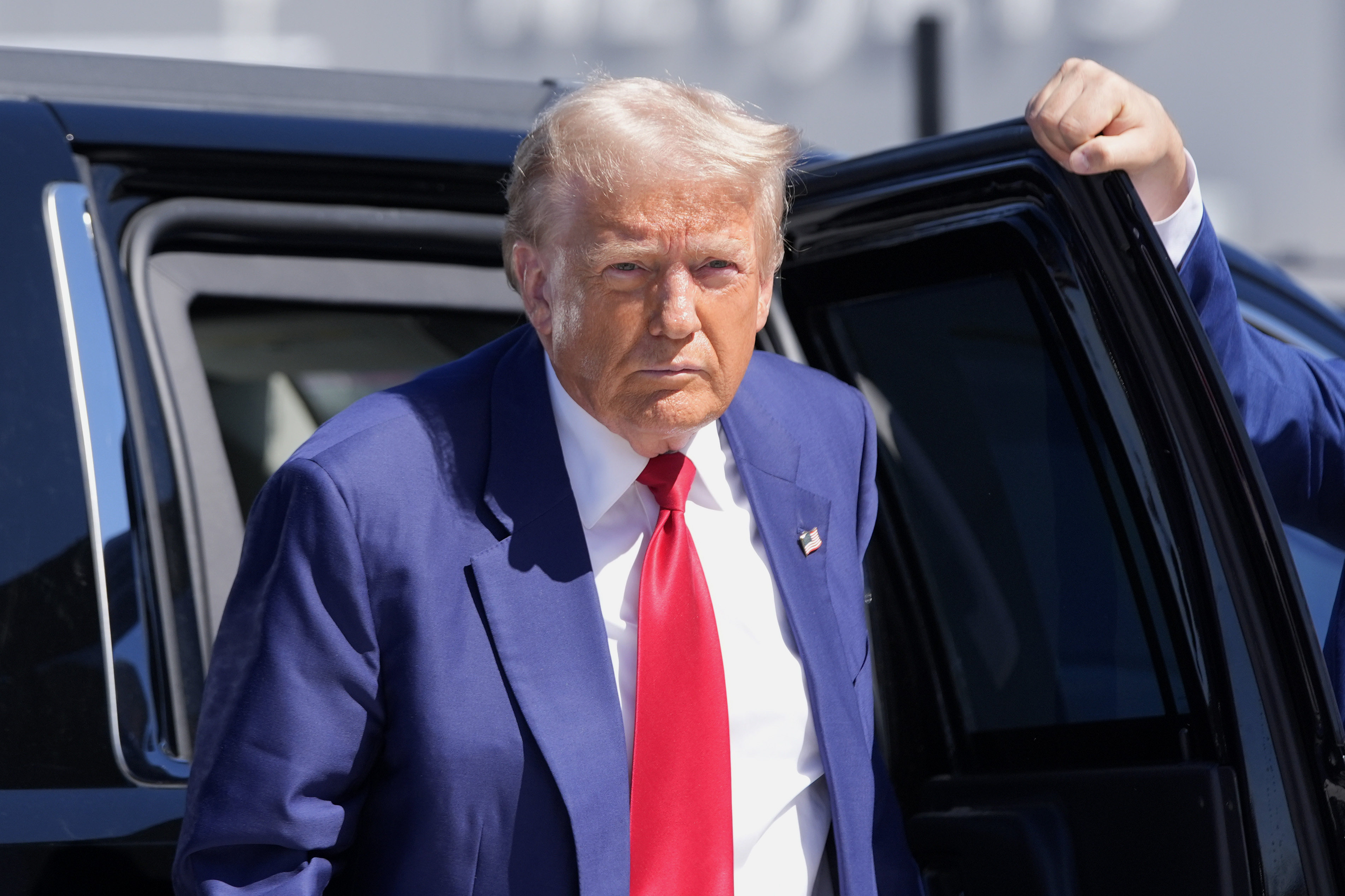 Donald Trump arrives to board a plane after a campaign trip in Las Vegas on Saturday. Photo: AP