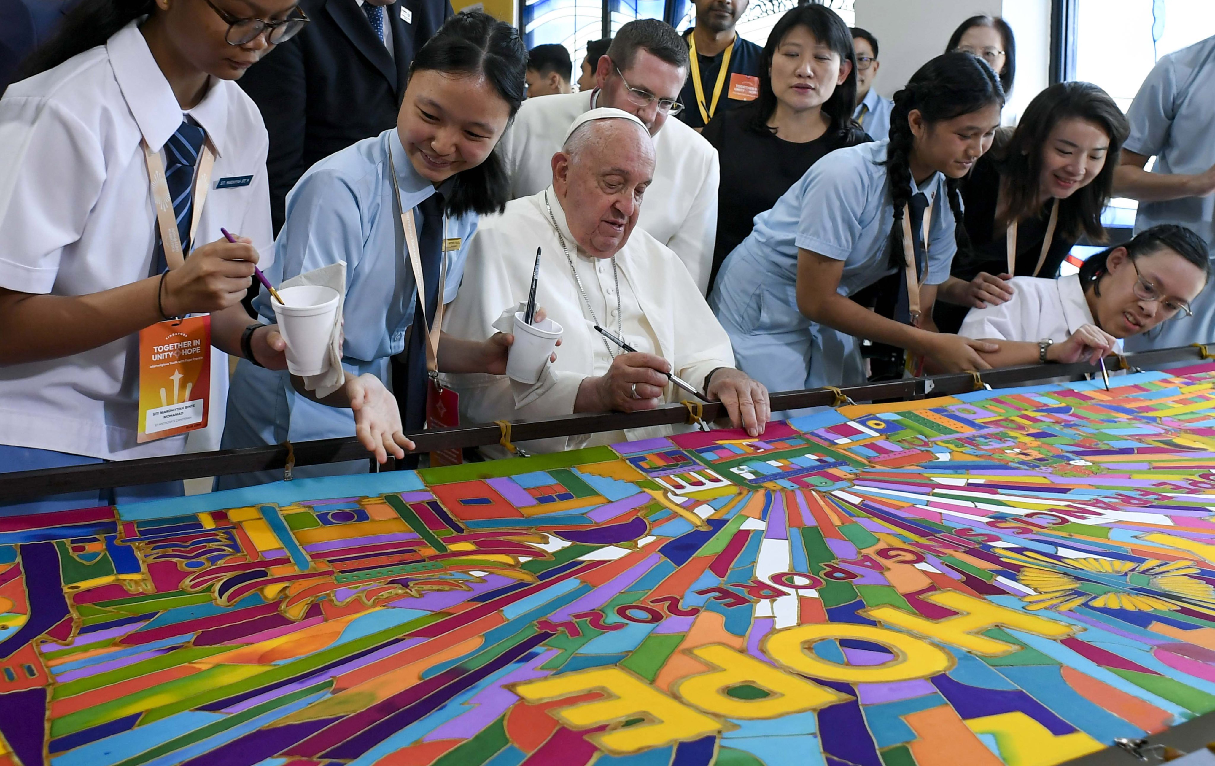 Pope Francis attends an interreligious meeting with young people at Singapore’s Catholic Junior College on Friday. Photo: dpa