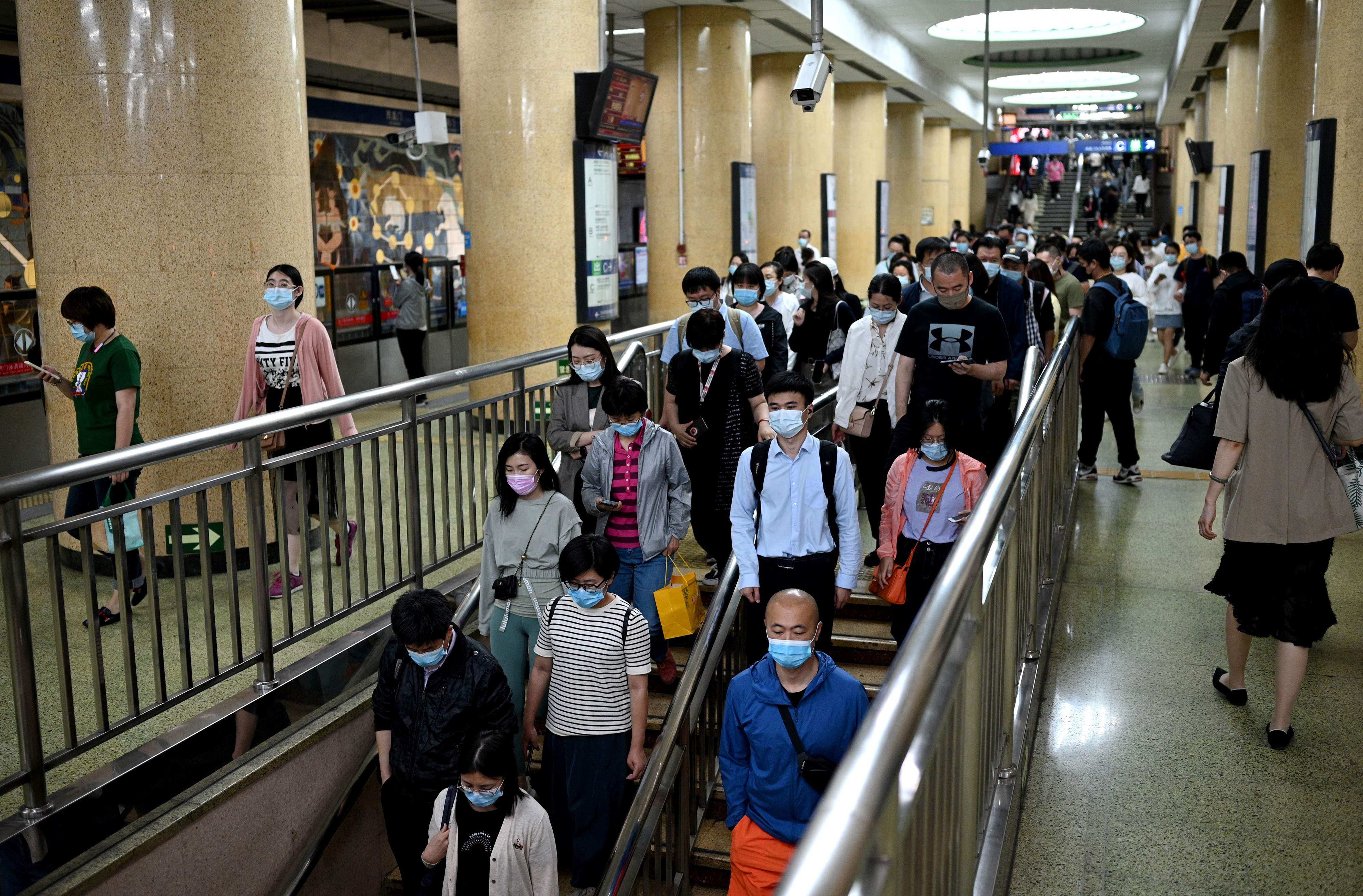 This photo taken on June 2, 2021 shows commuters during rush hour in Beijing. China’s one-child policy has depleted the country’s future supply of workers. Photo: AFP