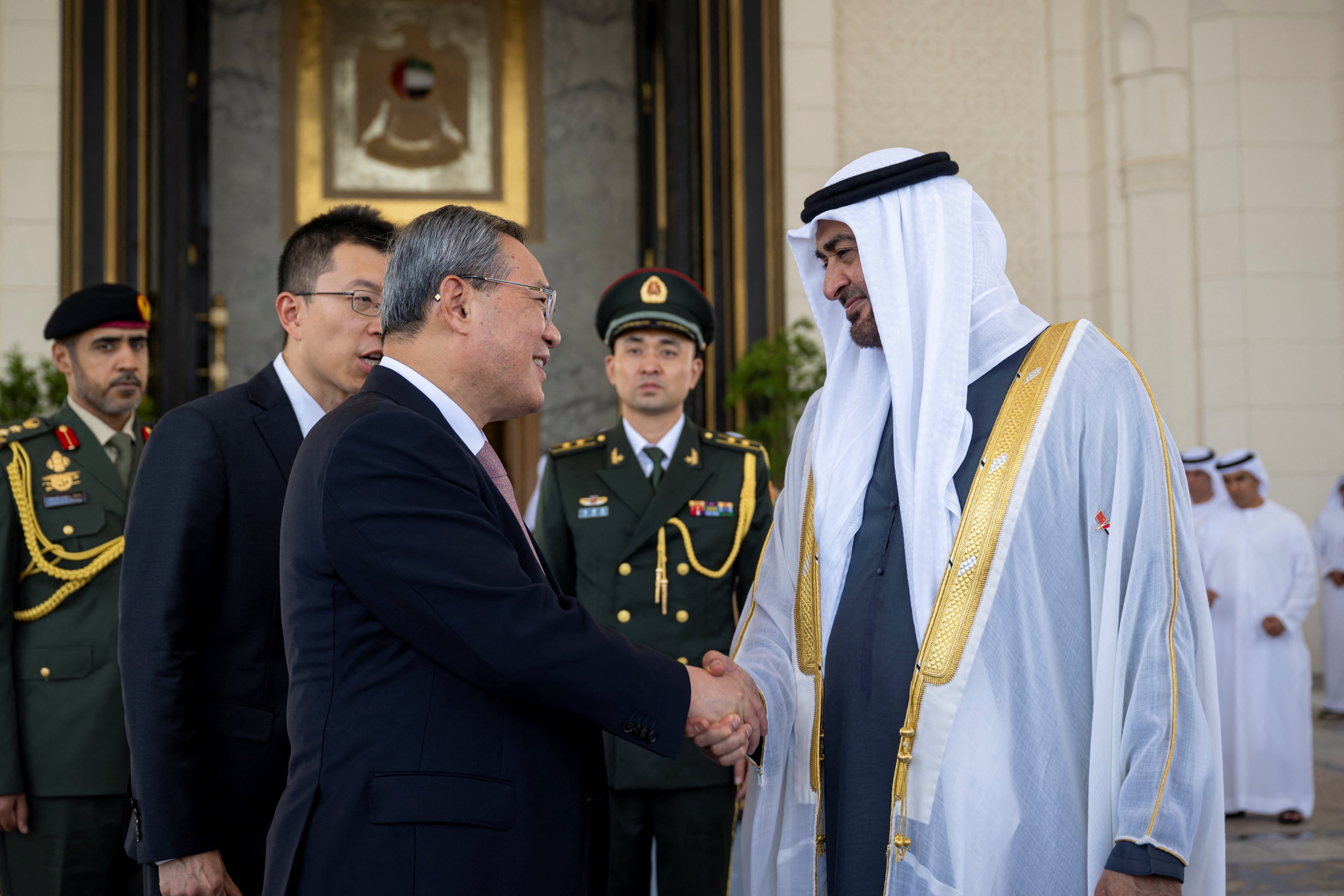 UAE President Sheikh Mohamed bin Zayed al-Nahyan (right) bids farewell to Premier Li Qiang after an official reception in Abu Dhabi on September 12. Photo: Reuters