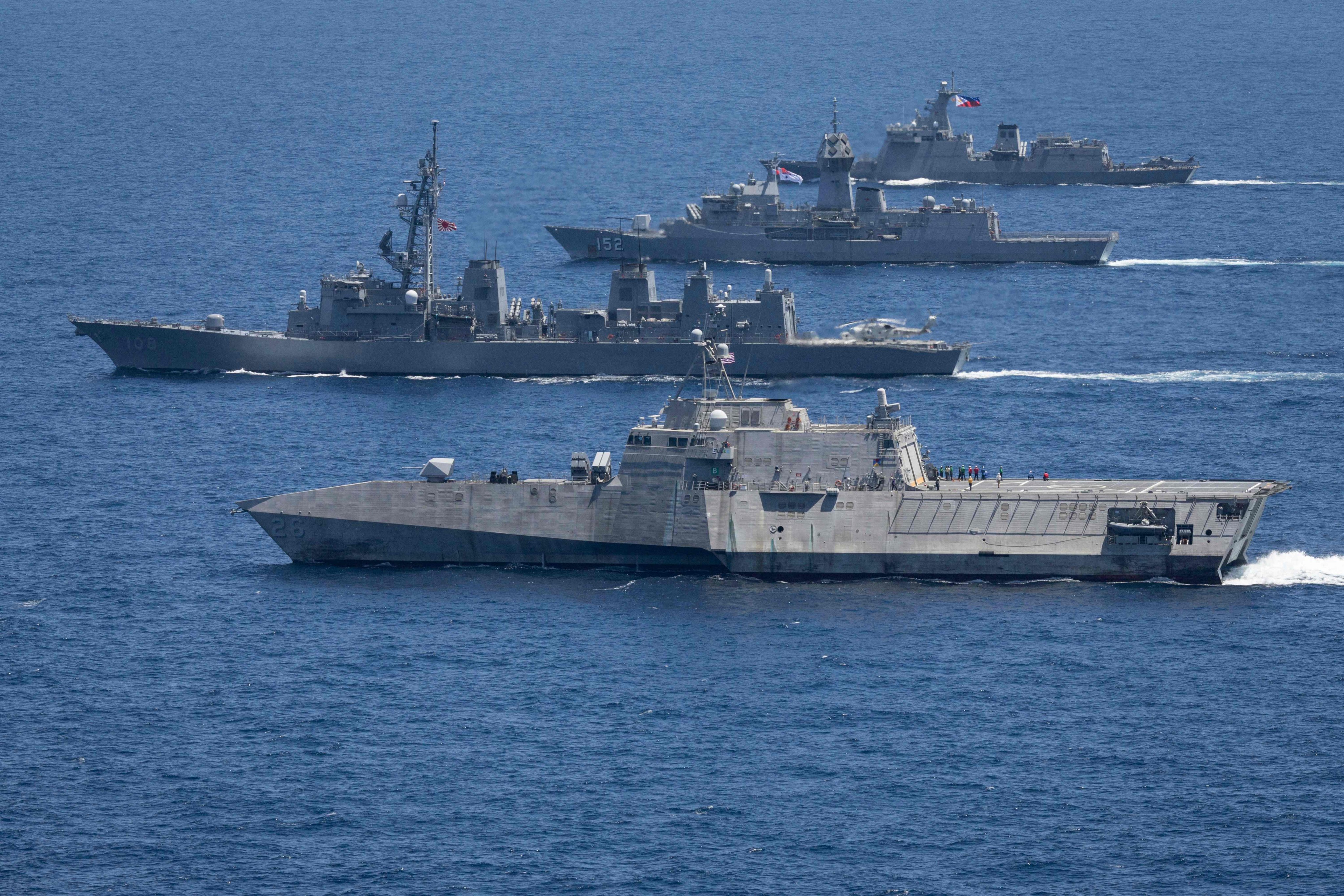 Vessels sailing in formation during a multilateral maritime cooperative activity between Australia, the United States, Japan and the Philippines off the coast within the Philippines’ exclusive economic zone in April. Photo: Australian Department of Defence/AFP