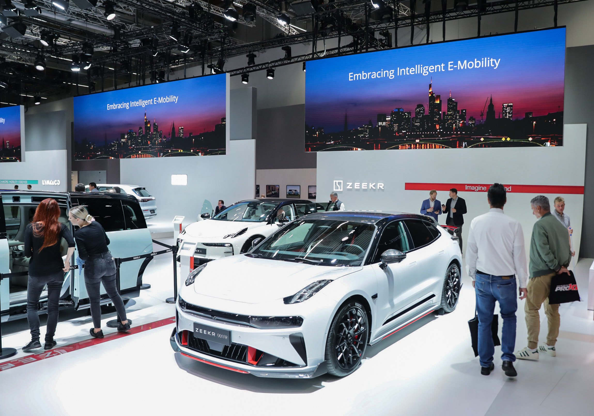 Visitors at an electric vehicle expo in Frankfurt, Germany, look at a Zeekr automobile, manufactured by the Chinese company Geely. Photo: Xinhua