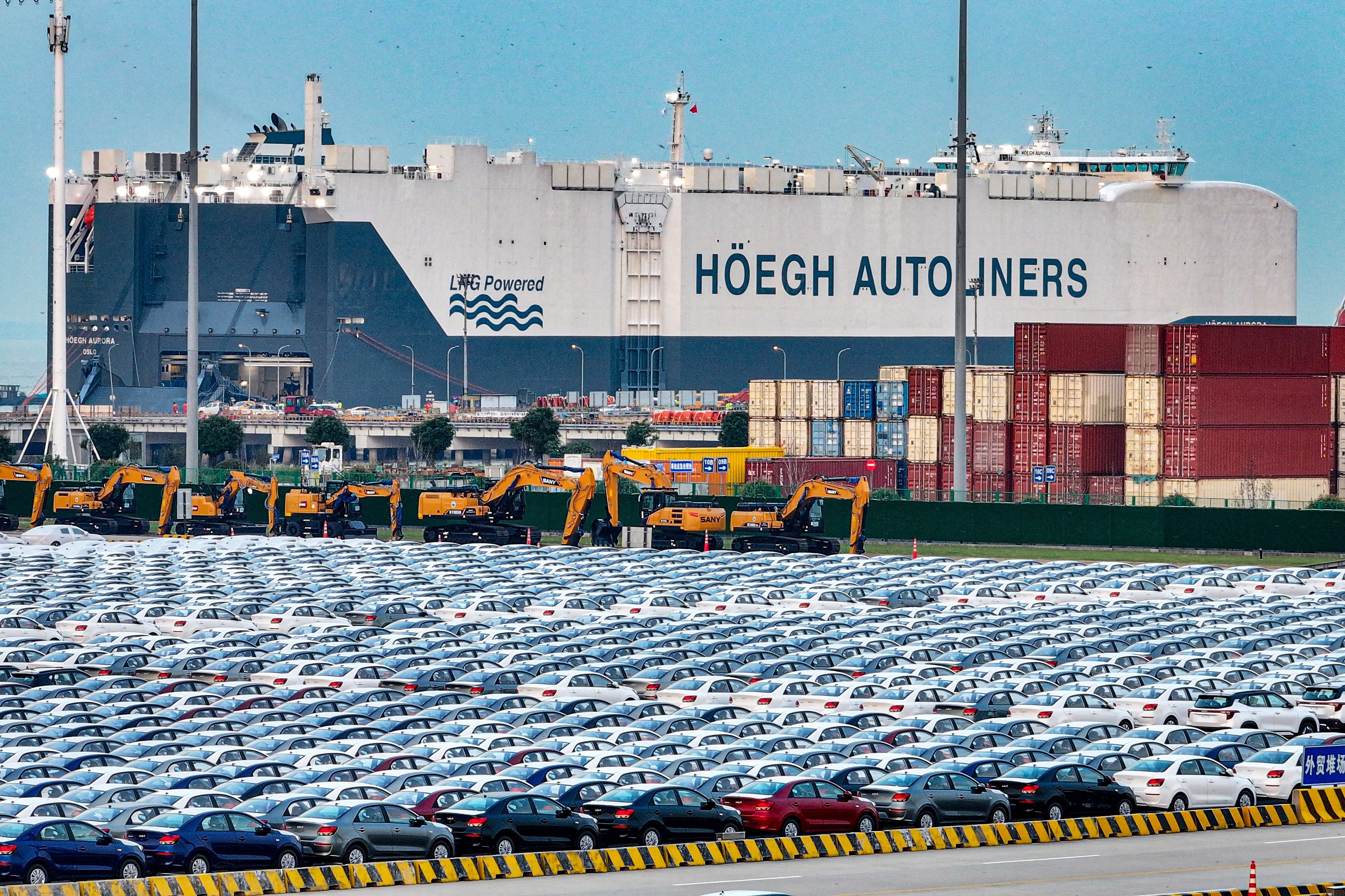 Cars wait to be loaded onto a shipping vessel for export in China’s Jiangsu province last month. Photo: AFP