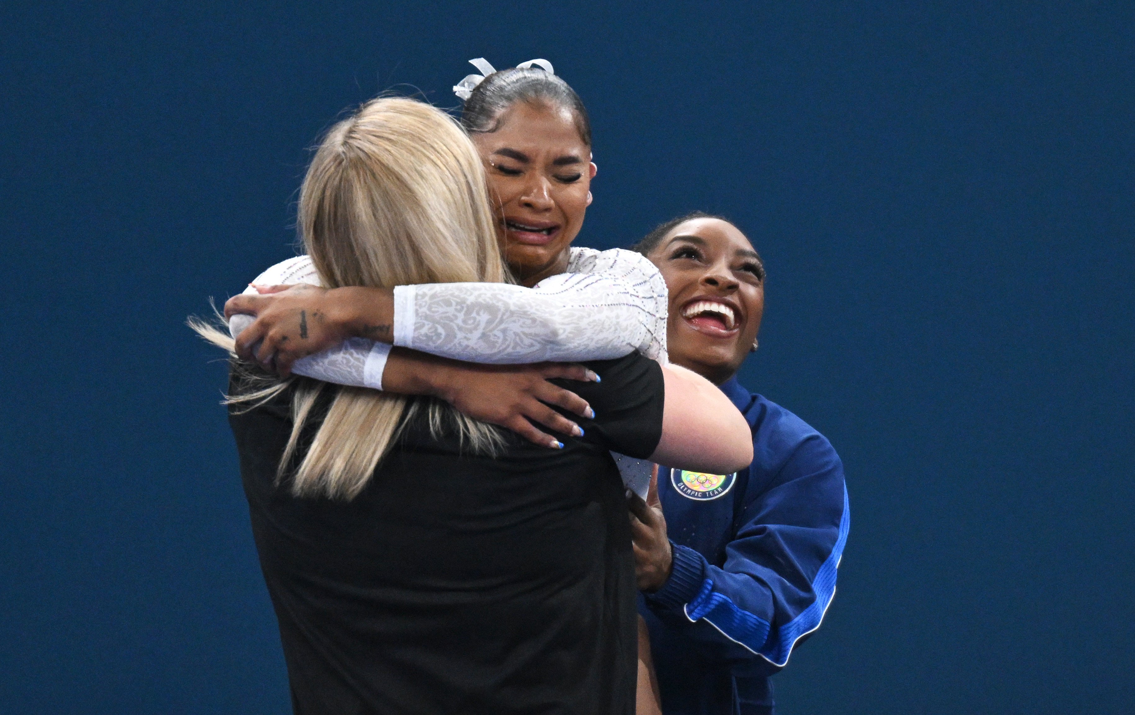 US gymnast Jordan Chiles (centre) celebrates her bronze medal and Simone Biles (right) celebrates her silver in the women’s floor final at the Paris 2024 Olympic Games. Photo: dpa