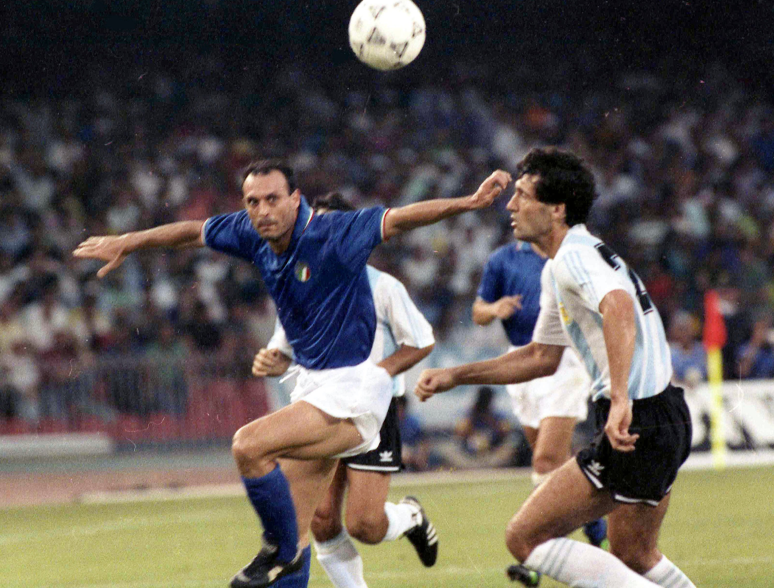 Italy’s Salvatore “Toto“ Schillaci (left) and Argentina’s Juan Simon chase the ball during the 1990 World Cup semi-final, which Argentina won on penalties. Photo: AP