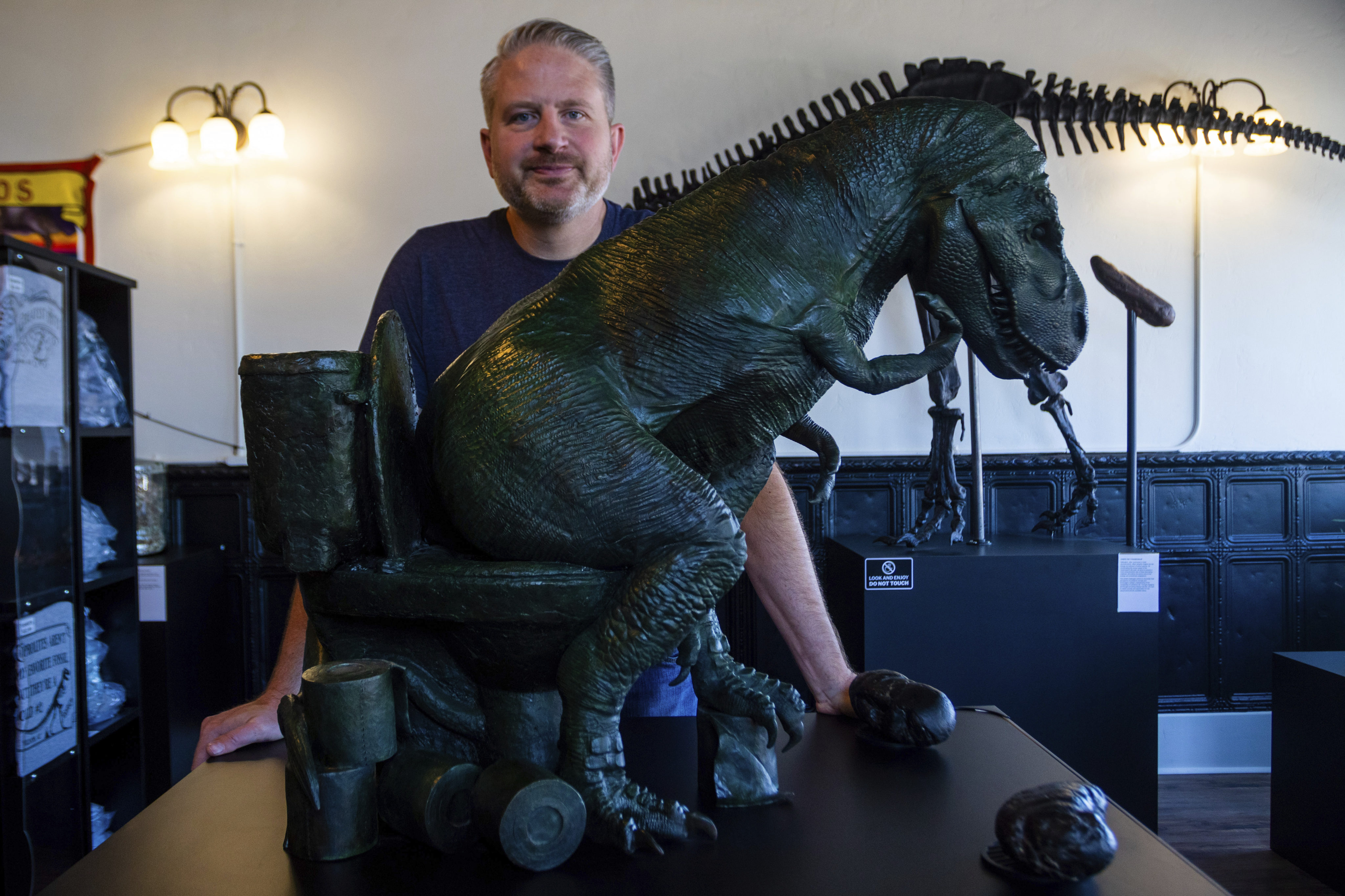 President and curator of the Poozeum George Frandsen, who has been collecting coprolites for nearly three decades. His museum features roughly 7,000 fossils, including one suspected to be from a Tyrannosaurus rex. Photo: AP