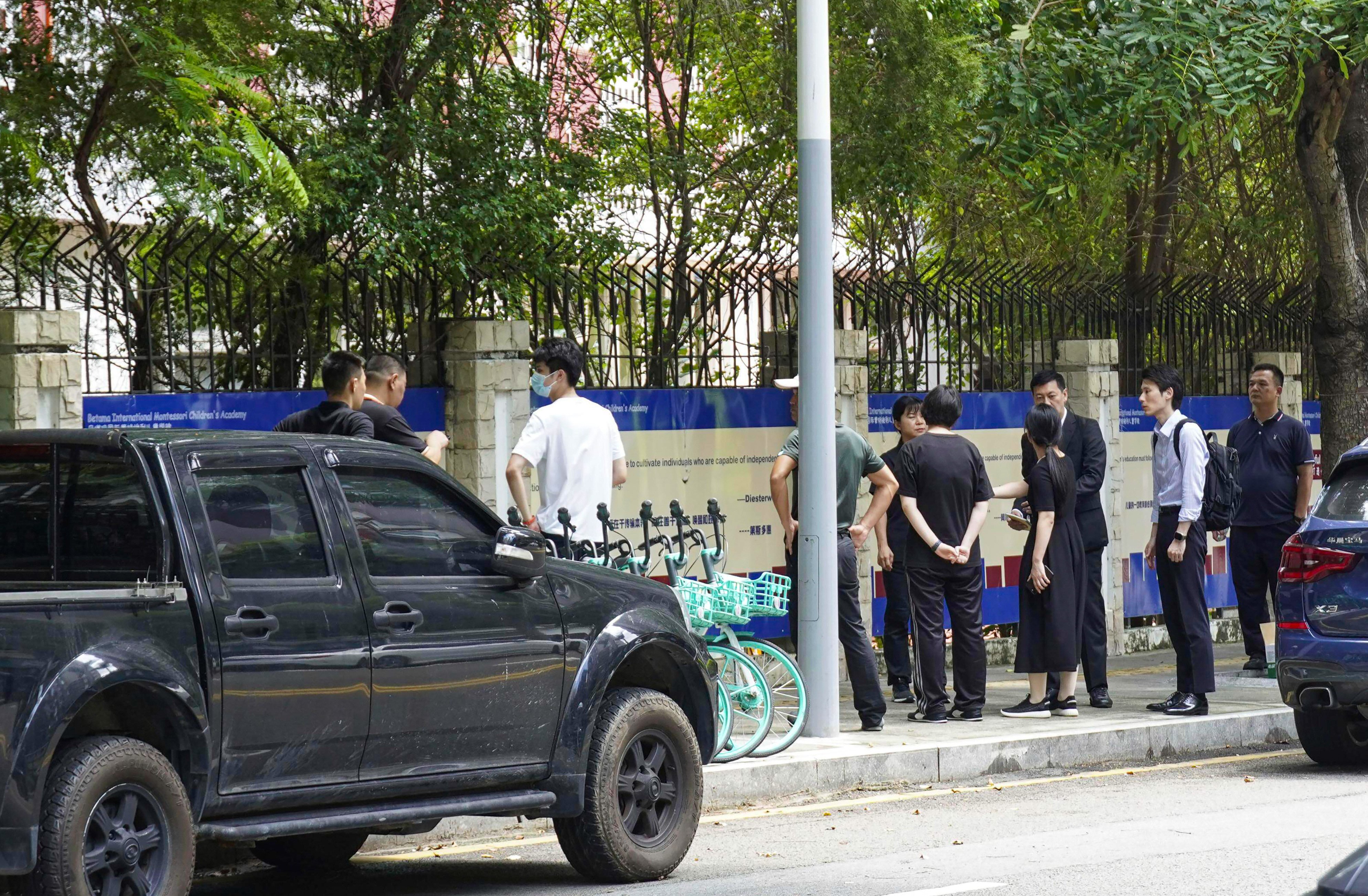 Chinese authorities inspect the scene of a stabbing at the Shenzhen Japanese School on Wednesday. A 10-year-old student attacked by a man died on Thursday. Photo: Kyodo