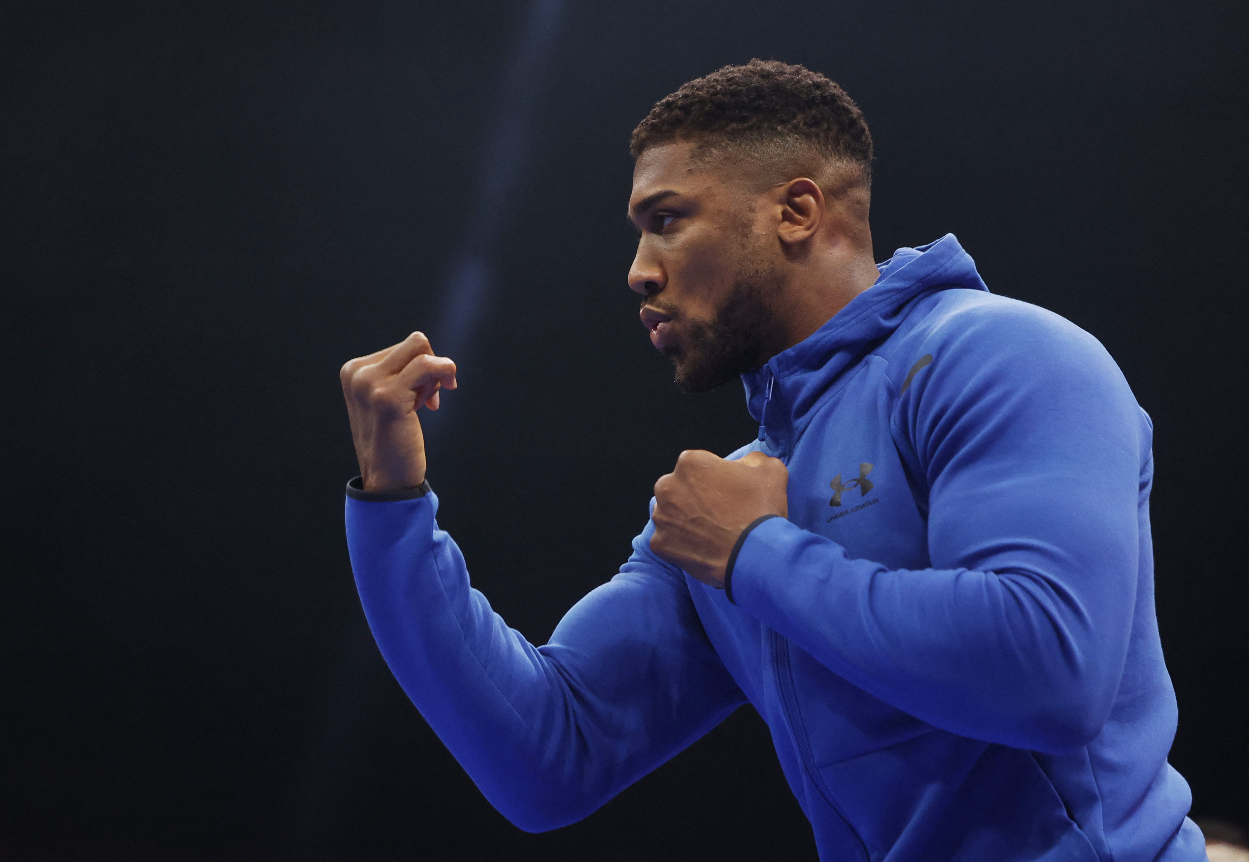 A win for Anthony Joshua against Daniel Dubois on Saturday would mean climbing the mountain once again, but a defeat could mean hanging up his gloves. Photo: Reuters