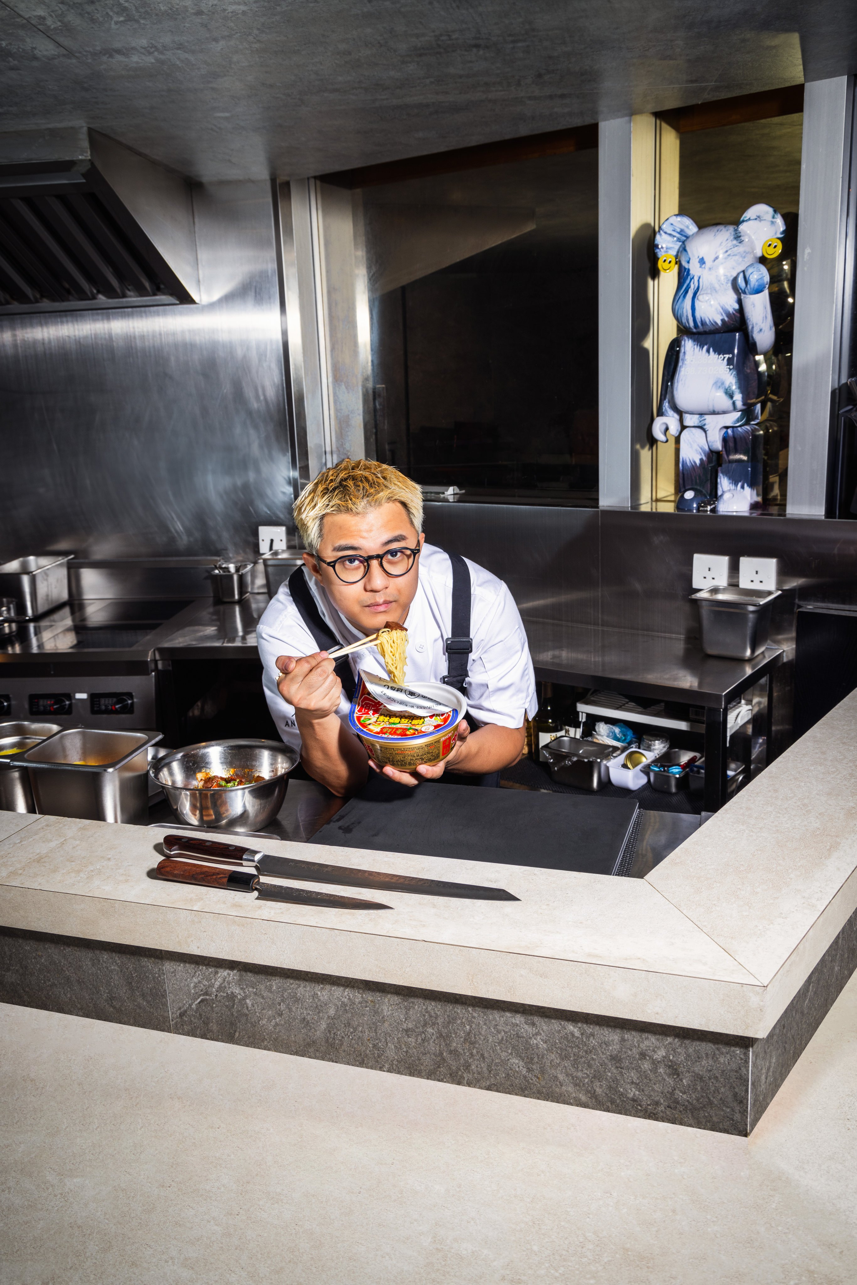 Hong Kong chef Frankie Wong of Ankôma takes a break from service by indulging in a pot noodle. Photo: Jocelyn Tam