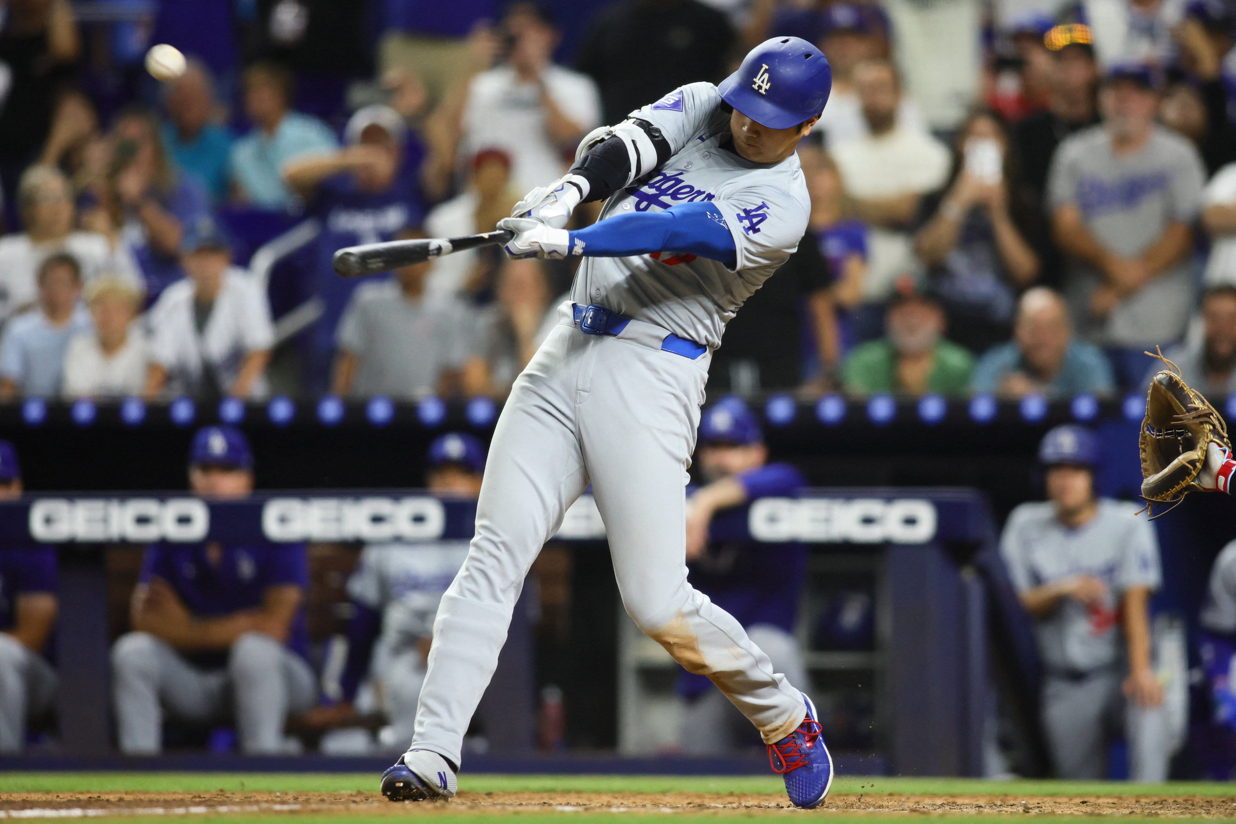 Los Angeles Dodgers designated hitter Shohei Ohtani hits a three-run home run against the Miami Marlins at loanDepot Park. Photo: Reuters