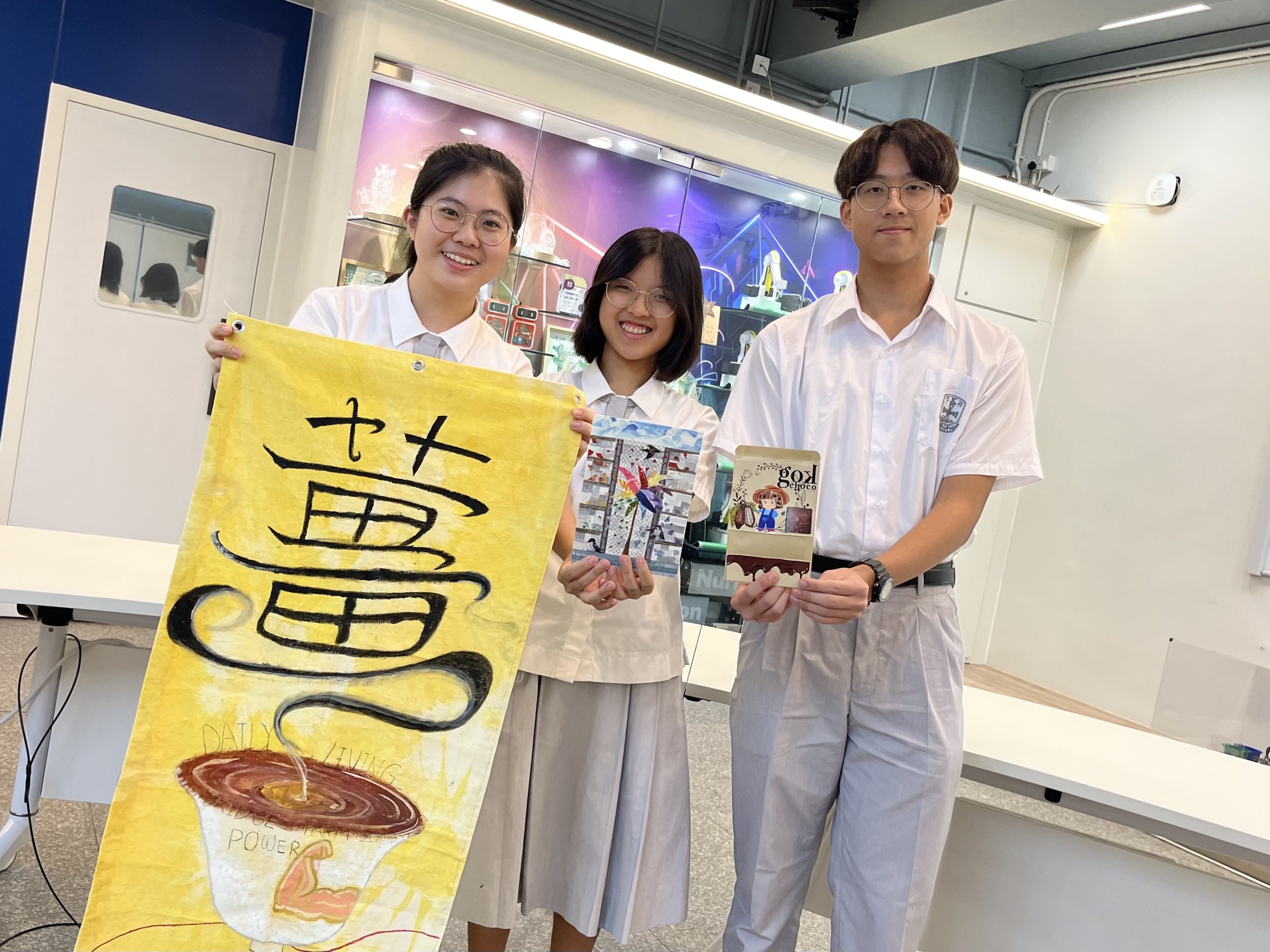 Vicky Hei (from left), Scarlett Chan and Vincent Zhou say they value the chance to use their creativity to help preserve Hong Kong culture. Photo: Kelly Fung