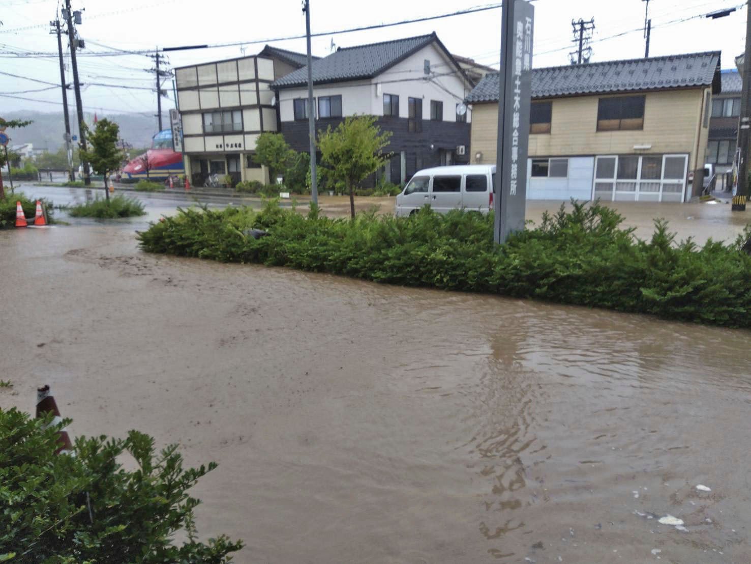 A road is flooded after heavy rain in Wajima, Ishikawa prefecture in Japan. Photo: AP