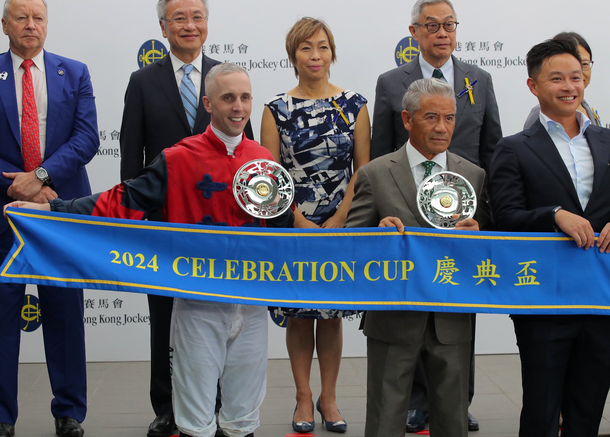 Jockey Brenton Avdulla and trainer Tony Cruz with their Group Three Celebration Cup (1,400m) spoils.