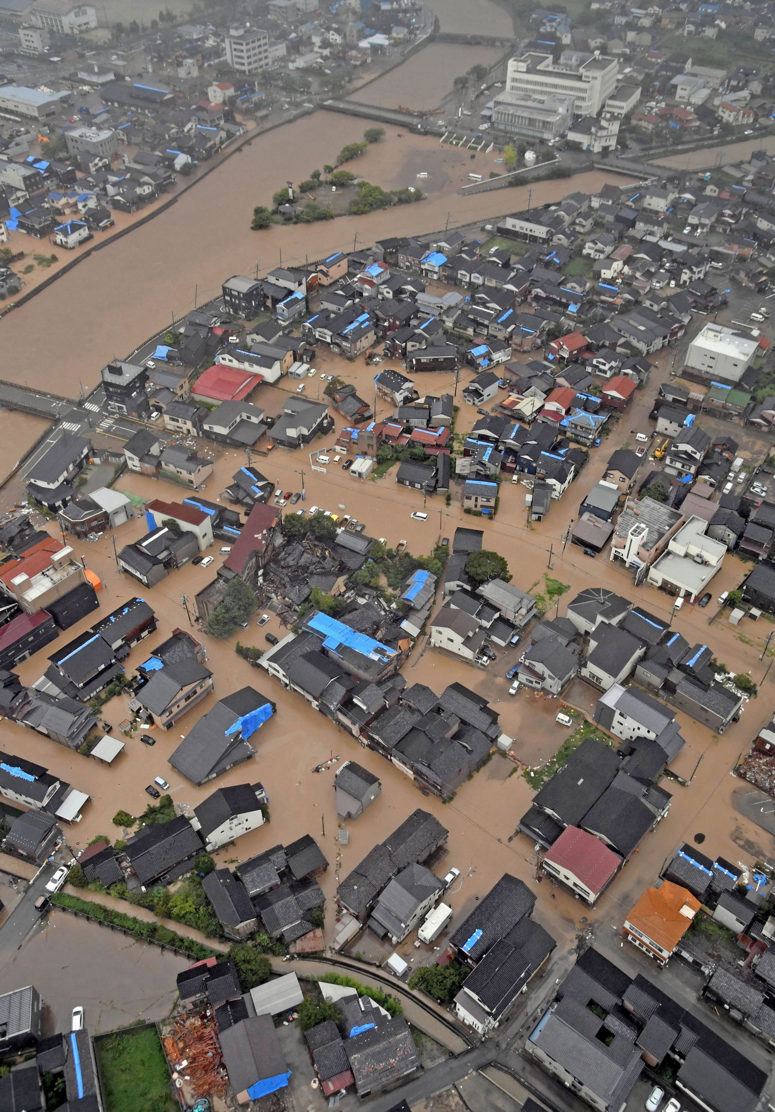 A flooded residential area in Wajima city, Ishikawa prefecture, Japan. Photo: Kyodo via Reuters