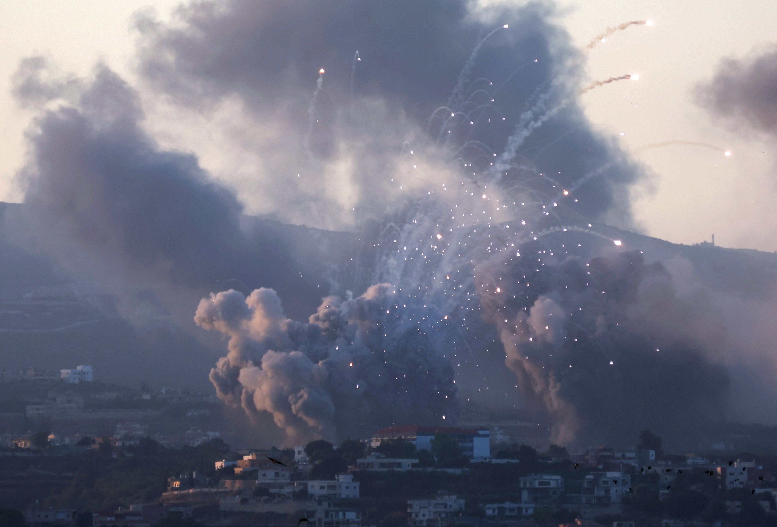 Smoke billows over southern Lebanon following Israeli strikes on Monday as cross-border hostilities with Hezbollah intensify. Photo: Reuters