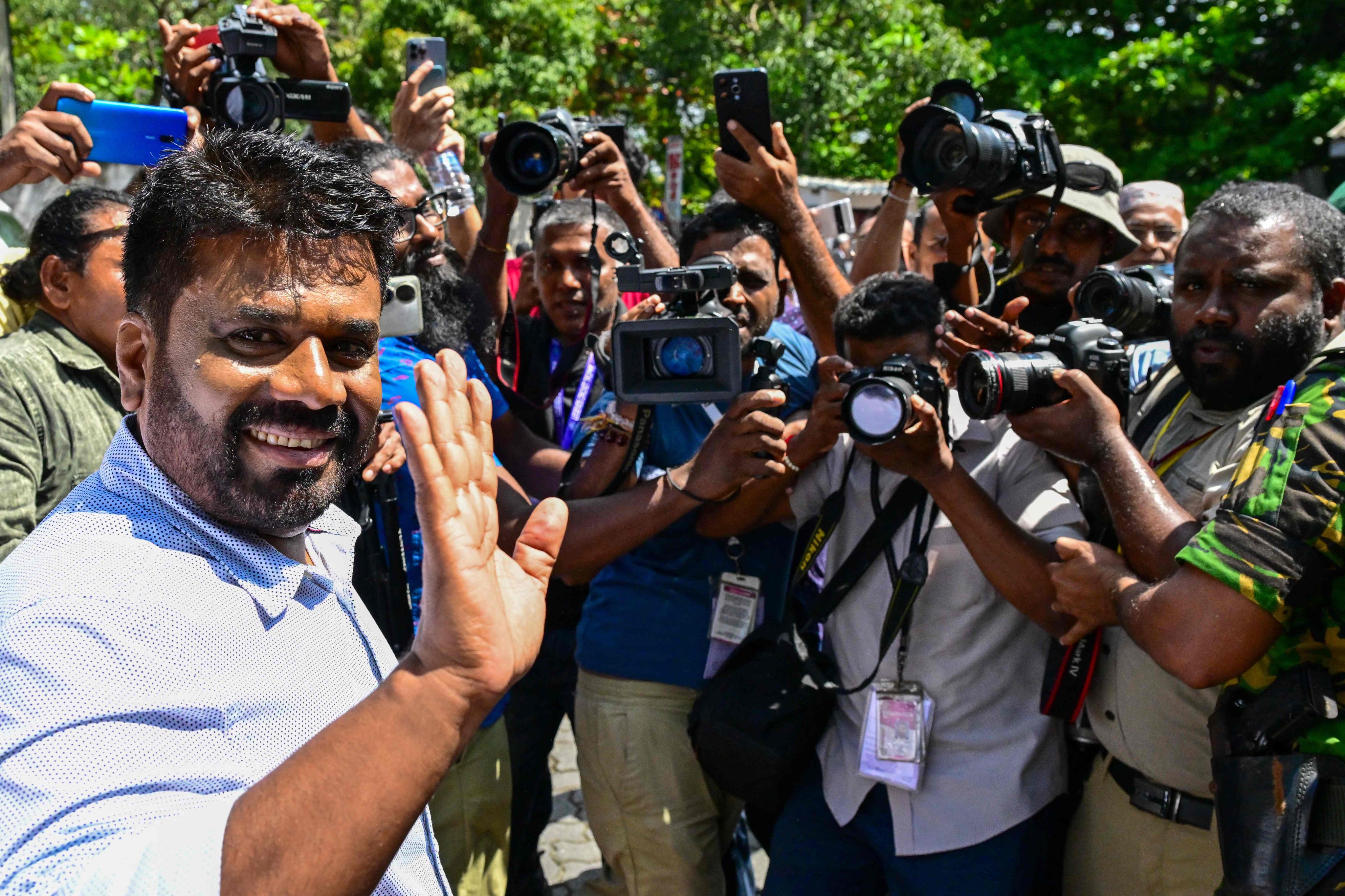 Anura Kumara Dissanayake leaves a polling station. Photo: AFP