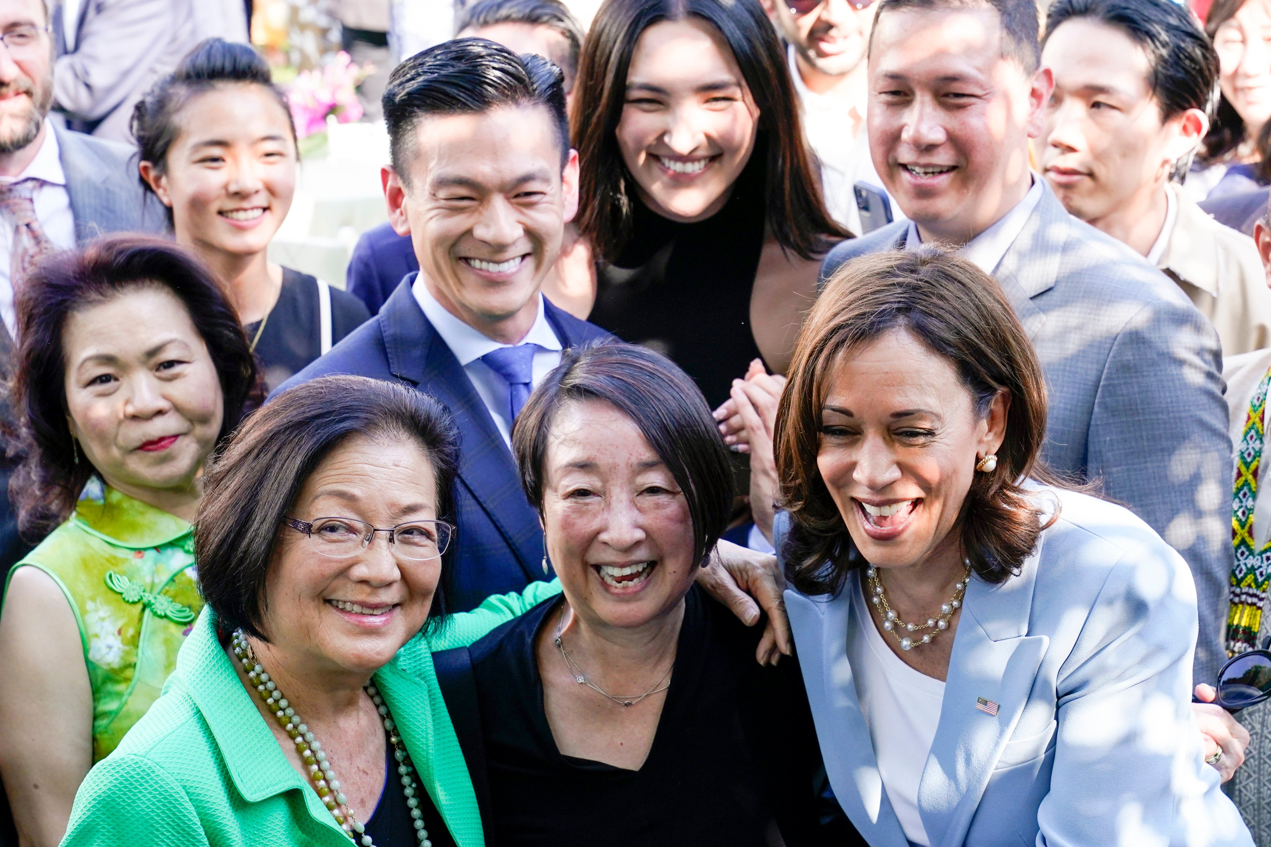 Vice-President Kamala Harris (right) takes a photo with Senator Mazie Hirono (left) and others, in the Rose Garden of the White House on May 17, 2022, during a reception to celebrate Asian American and Pacific Islander Heritage Month. Photo: AP