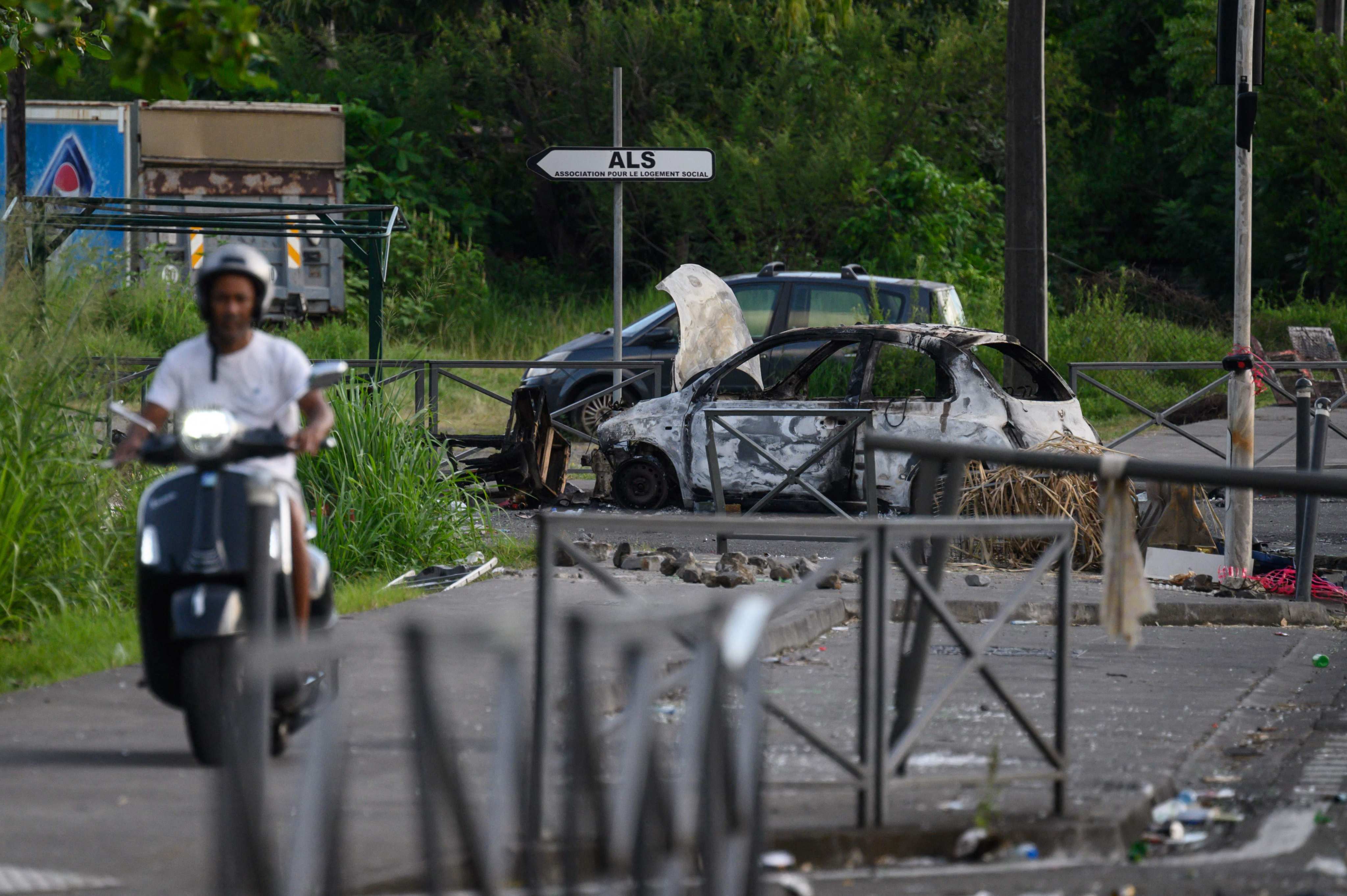 Burned-out cars in Fort-de-France, on the French Caribbean island of Martinique, days after riots erupted. Photo: AFP