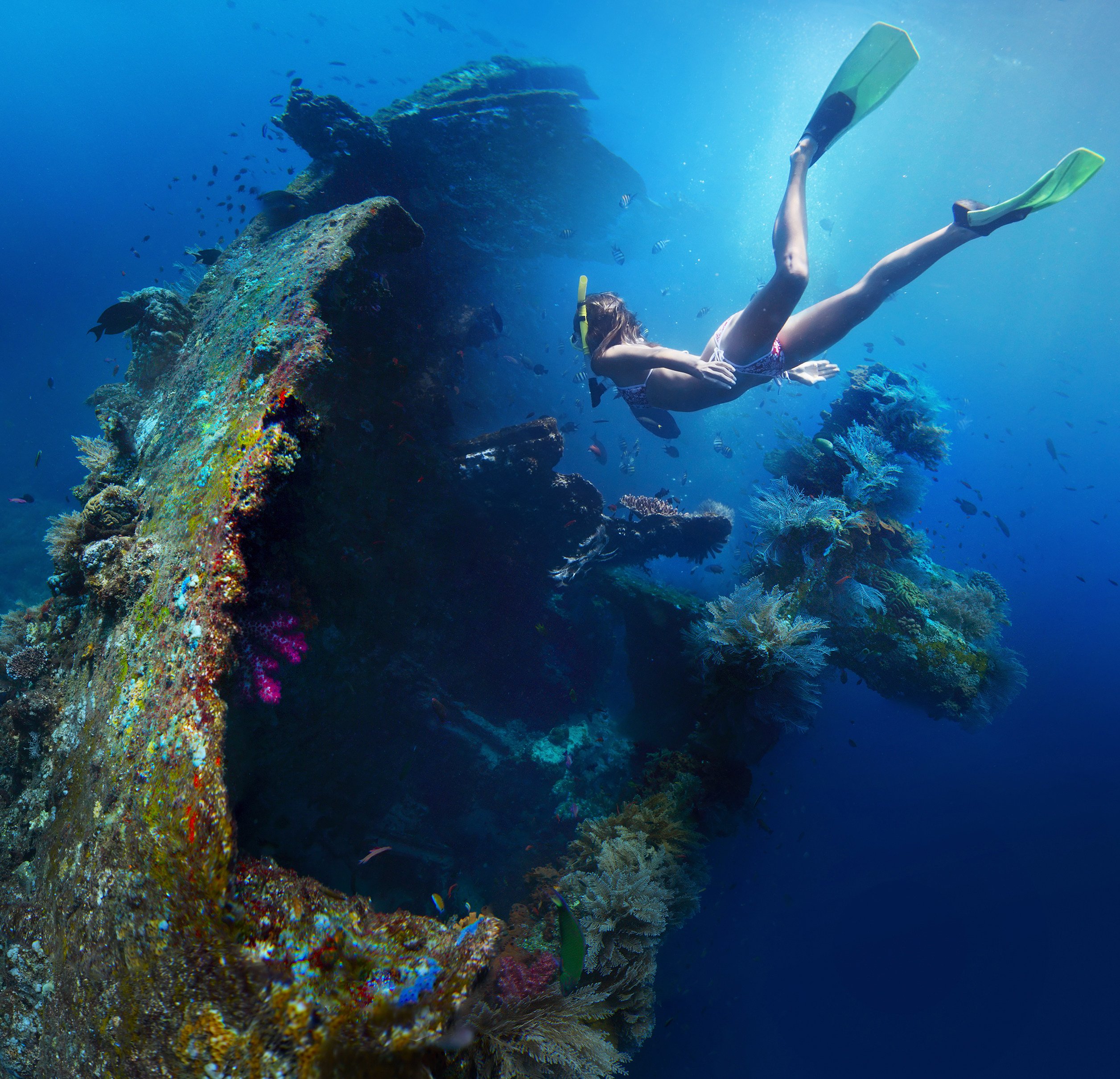 The wreck of USAT Liberty off Tulamben, Bali, Indonesia, is shallow enough for snorkelling, and is one of thousands of second world war wrecks divers can explore in Southeast Asian waters. Photo: Shutterstock