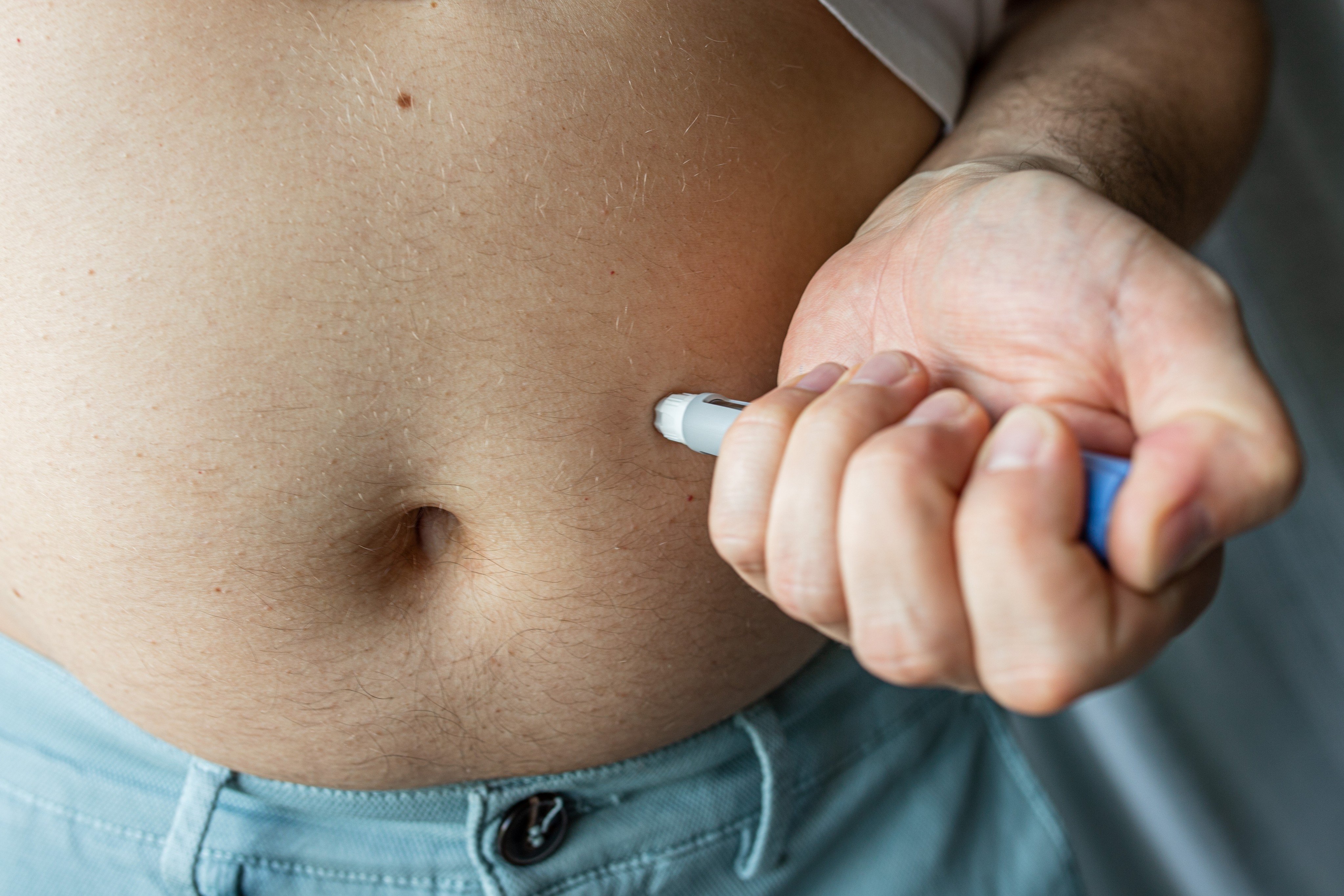 A man injects Ozempic. Two scientists newly honoured with the Albert Lasker Award for Clinical Medical Research recall their findings that paved the way for the development of what are seen as weight-loss wonder drugs. Photo: Shutterstock